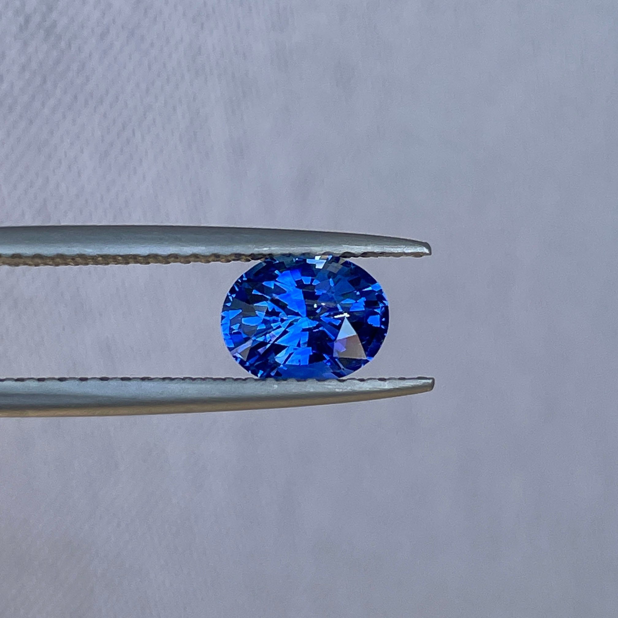 Close-up of a Ceylon sapphire engagement ring