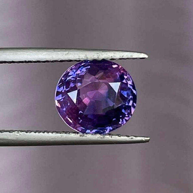 Winza sapphire engagement ring in purple hue