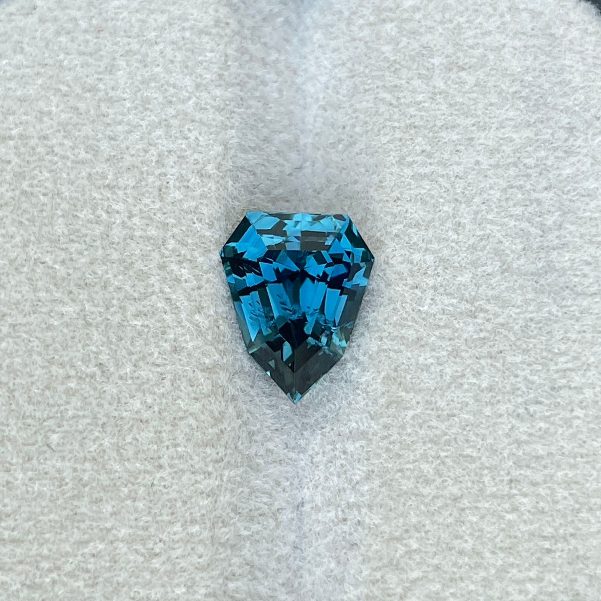 natural teal sapphire gemstone shield cut unheated