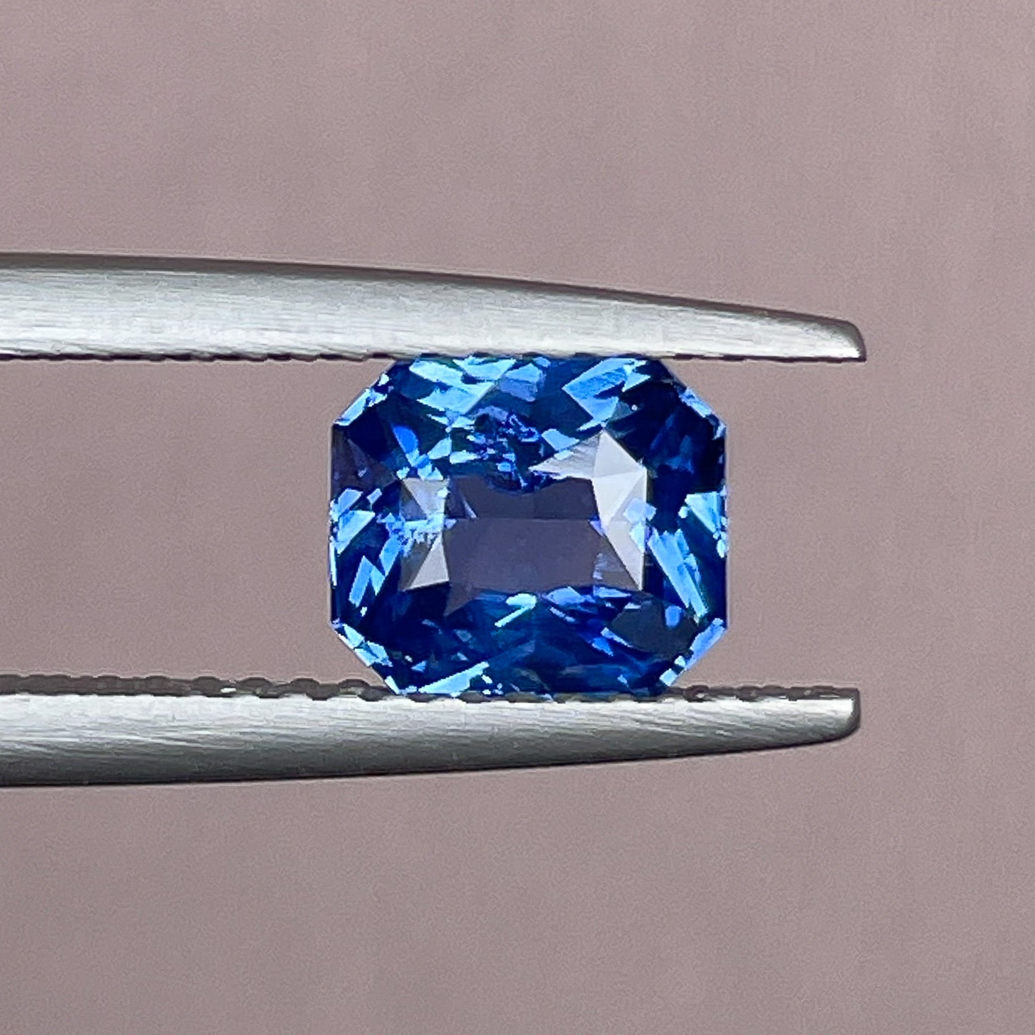 Natural Ceylon blue sapphire 1.52 Ct radiant cut by NASHGEMS, vivid blue loose gemstone for engagement or custom jewelry.