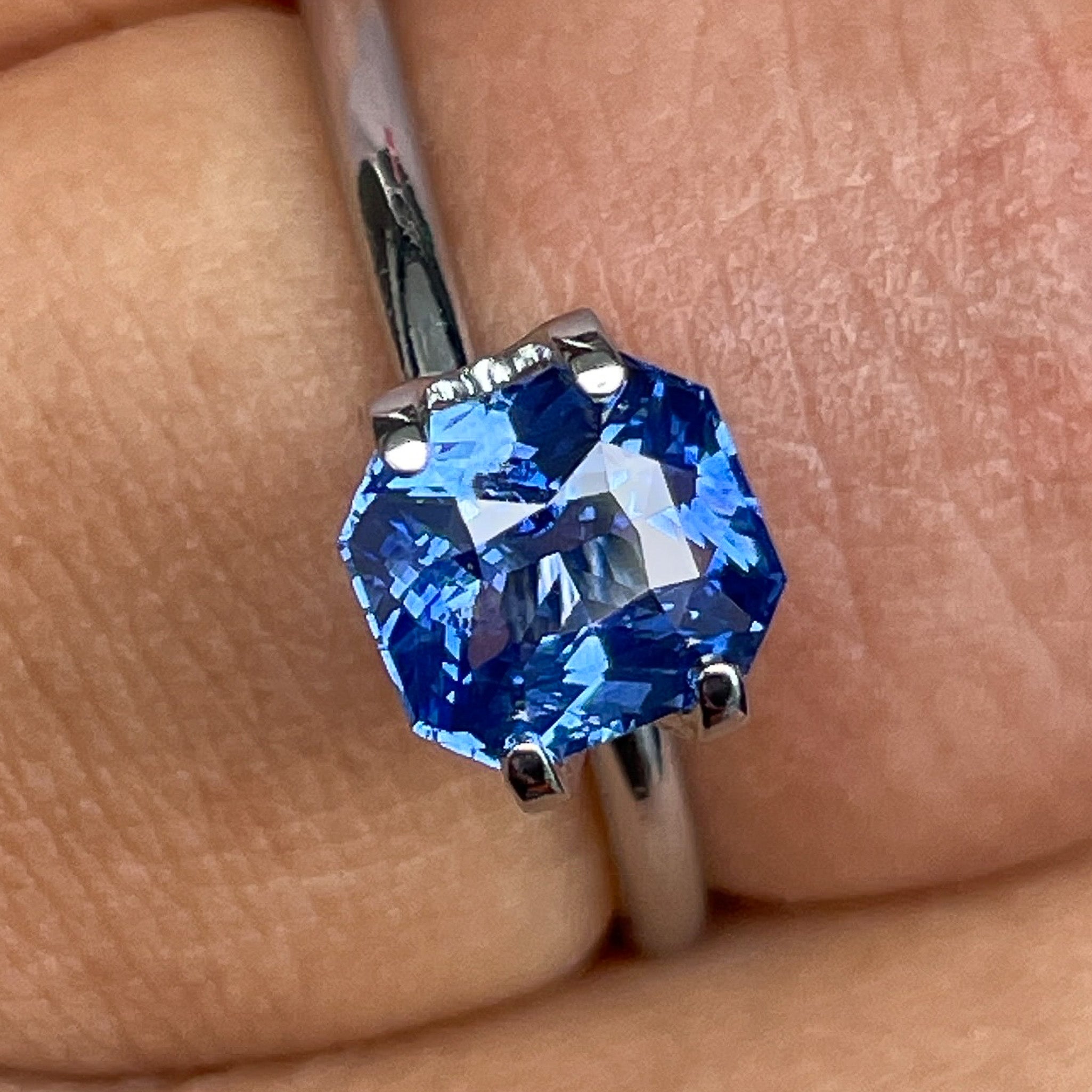 Natural Ceylon Blue Sapphire 1.52 Ct radiant cut by NASHGEMS, vivid blue loose gemstone for engagement or custom jewelry.