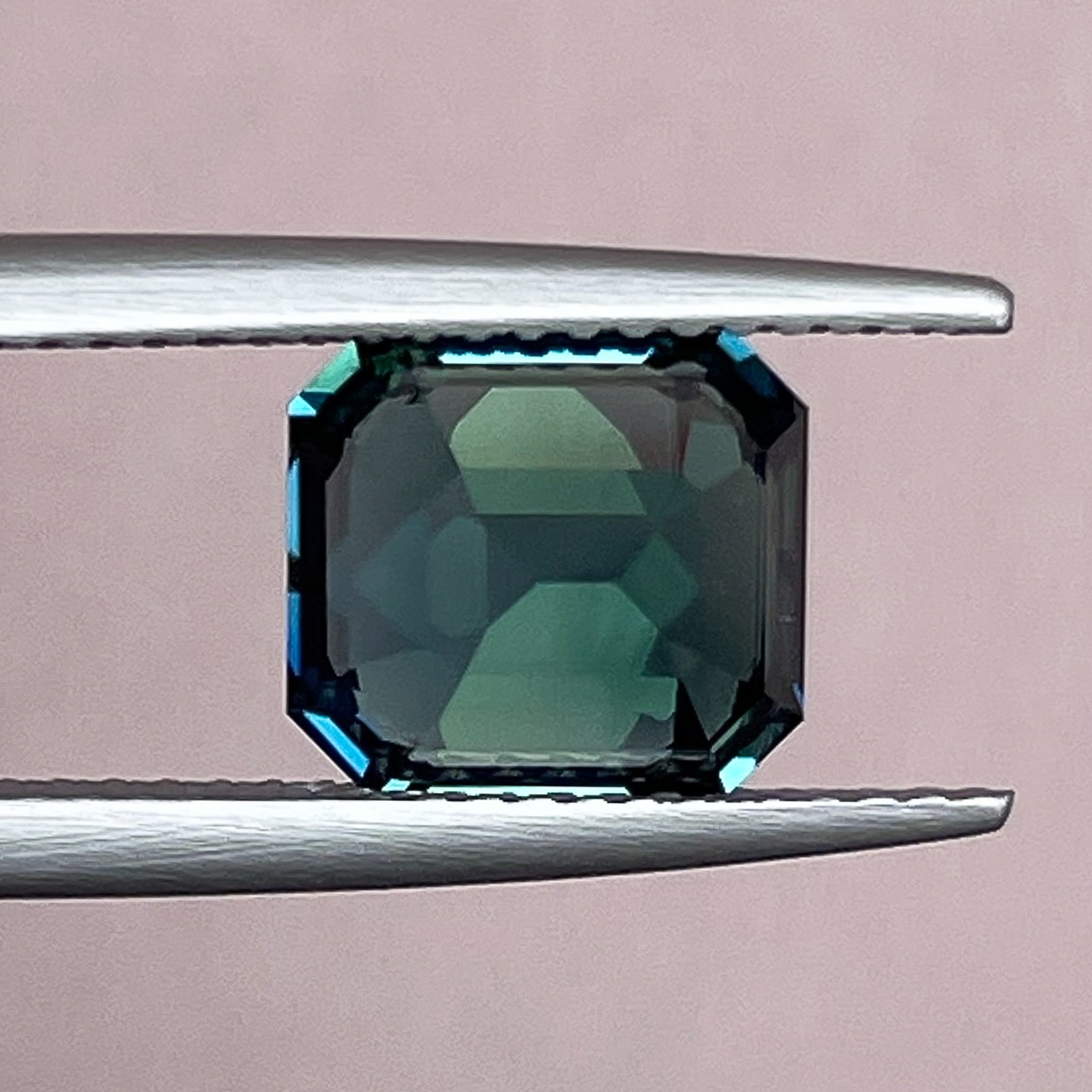 Natural forest green sapphire 3.59 Ct emerald cut loose gemstone by NASHGEMS, vibrant teal sapphire for custom engagement rings.