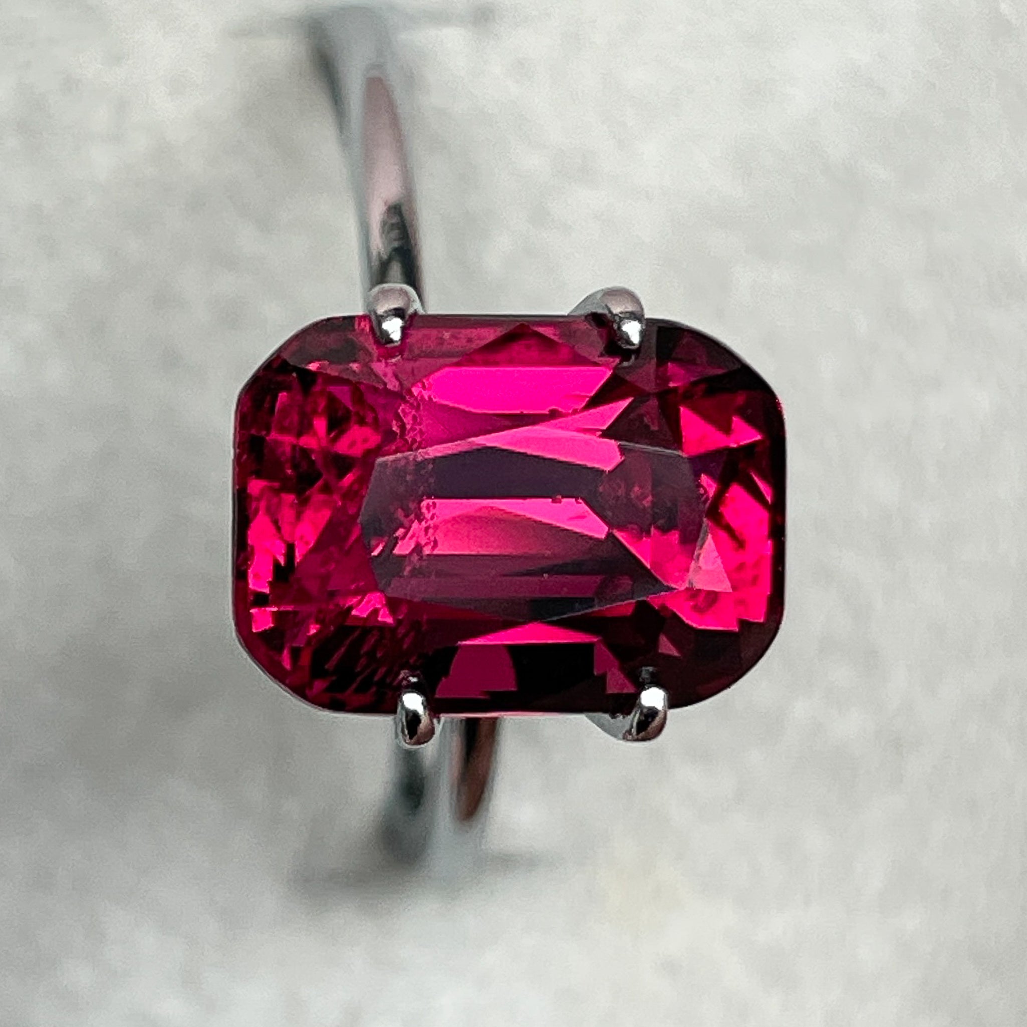 Natural Rhodolite Garnet 5 Ct cushion cut loose gemstone in raspberry red, ideal for engagement rings, by NASHGEMS.
