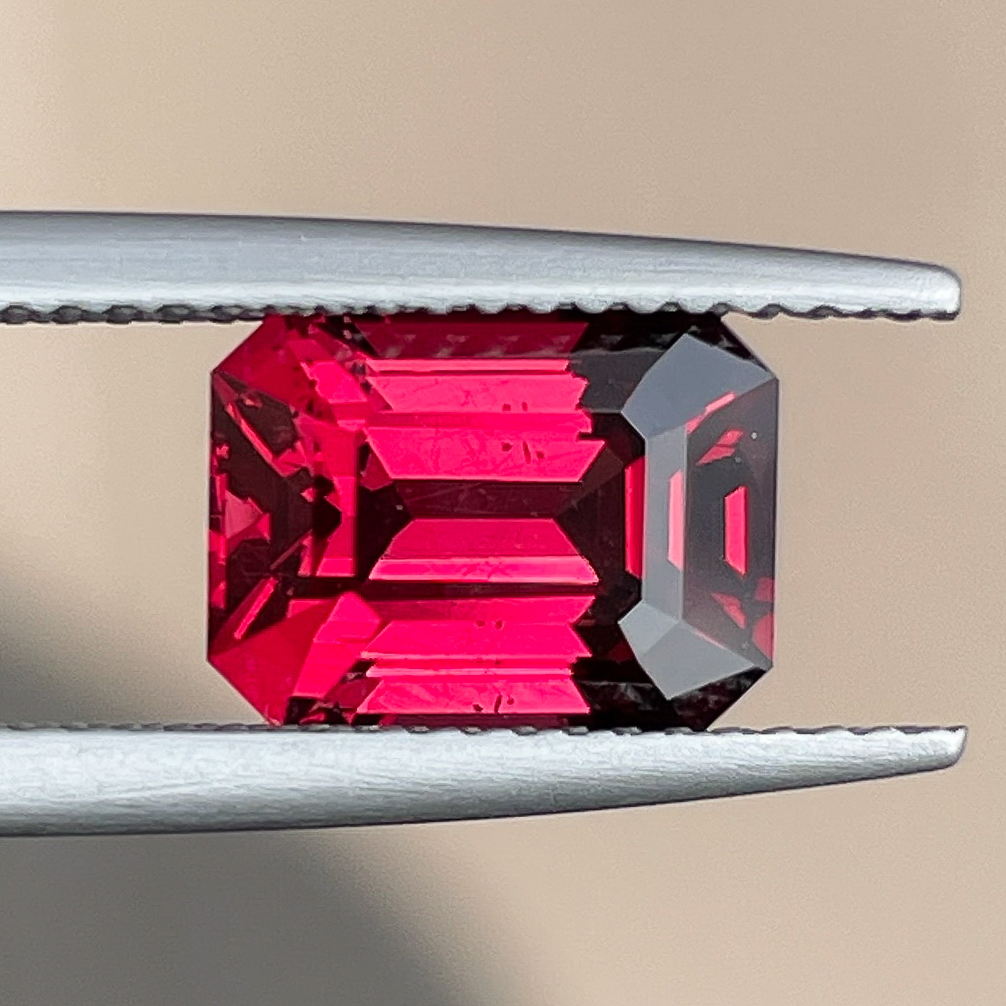 Deep red 3.38 Ct natural pyrope almandite garnet loose gemstone in emerald cut, ideal for engagement rings, by NASHGEMS.