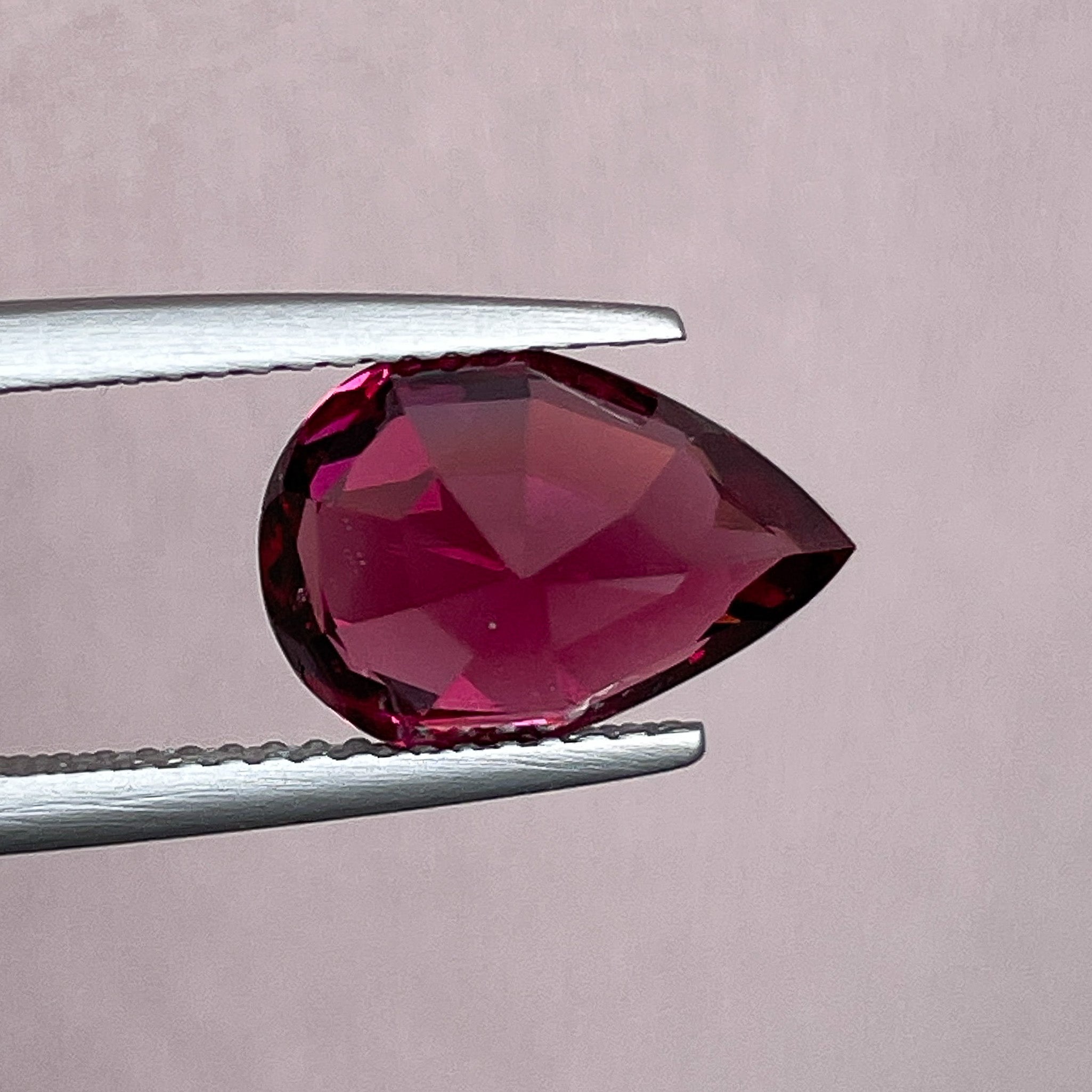 Natural Rhodolite Garnet 4.33 Ct pear-shaped loose gemstone with raspberry red color for engagement rings by NASHGEMS