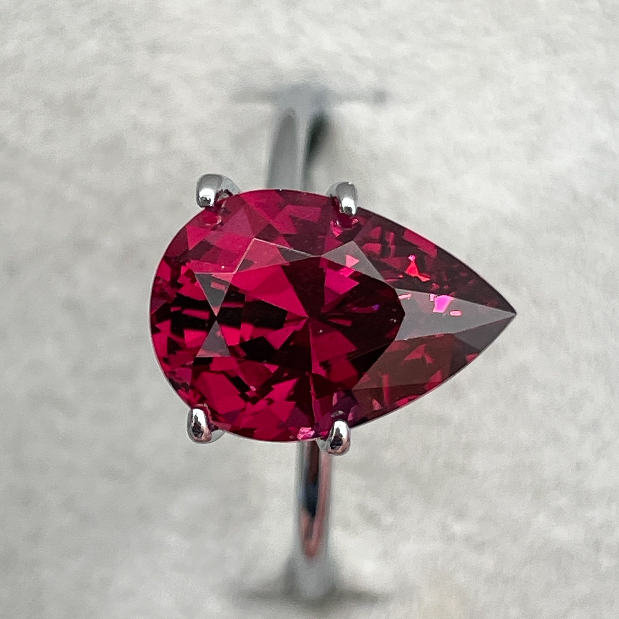 Natural Rhodolite Garnet 4.33 Ct pear-shaped loose gemstone with raspberry red color, ideal for engagement rings.