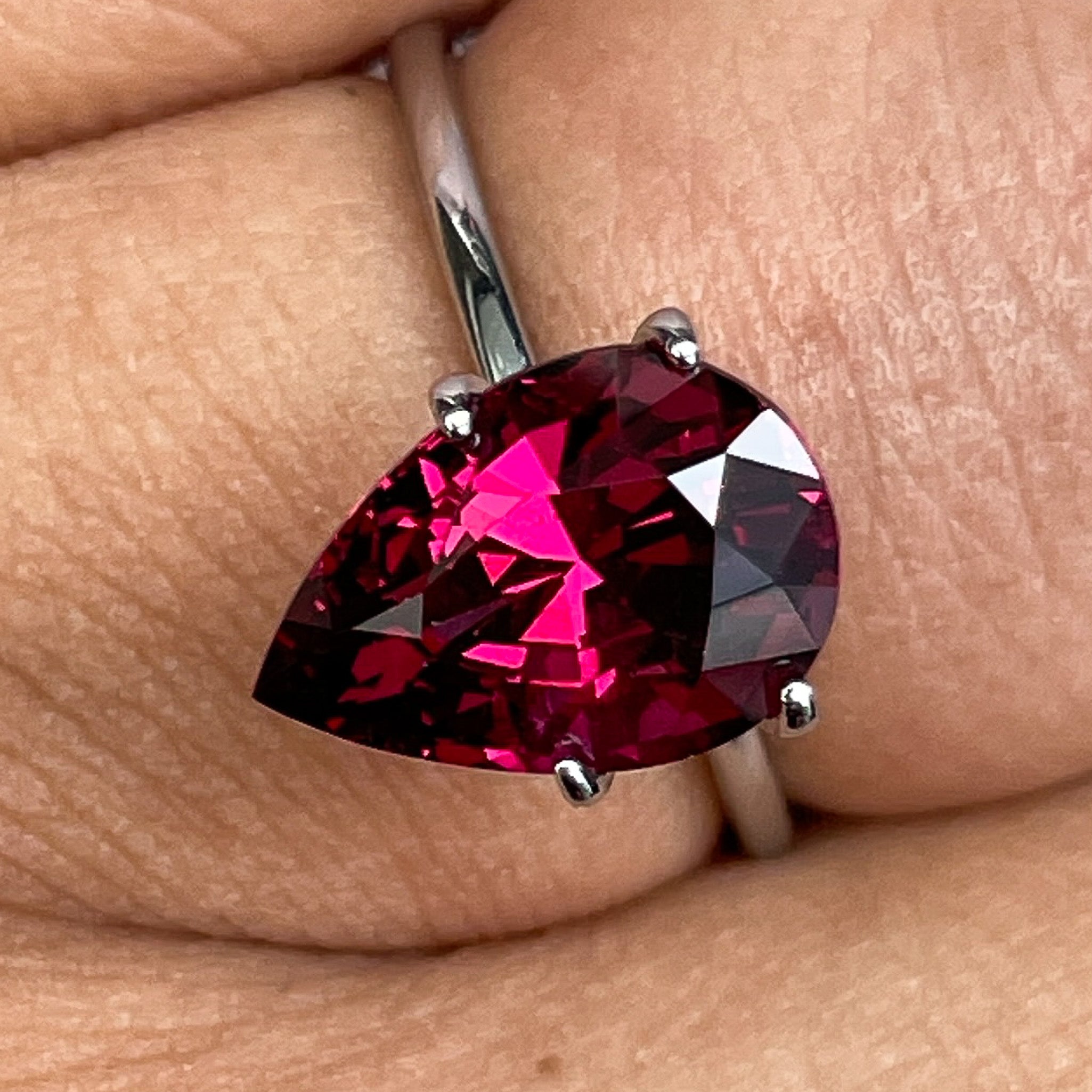 Natural Rhodolite Garnet 4.33 Ct pear-shaped loose gemstone with raspberry red color, ideal for engagement rings.