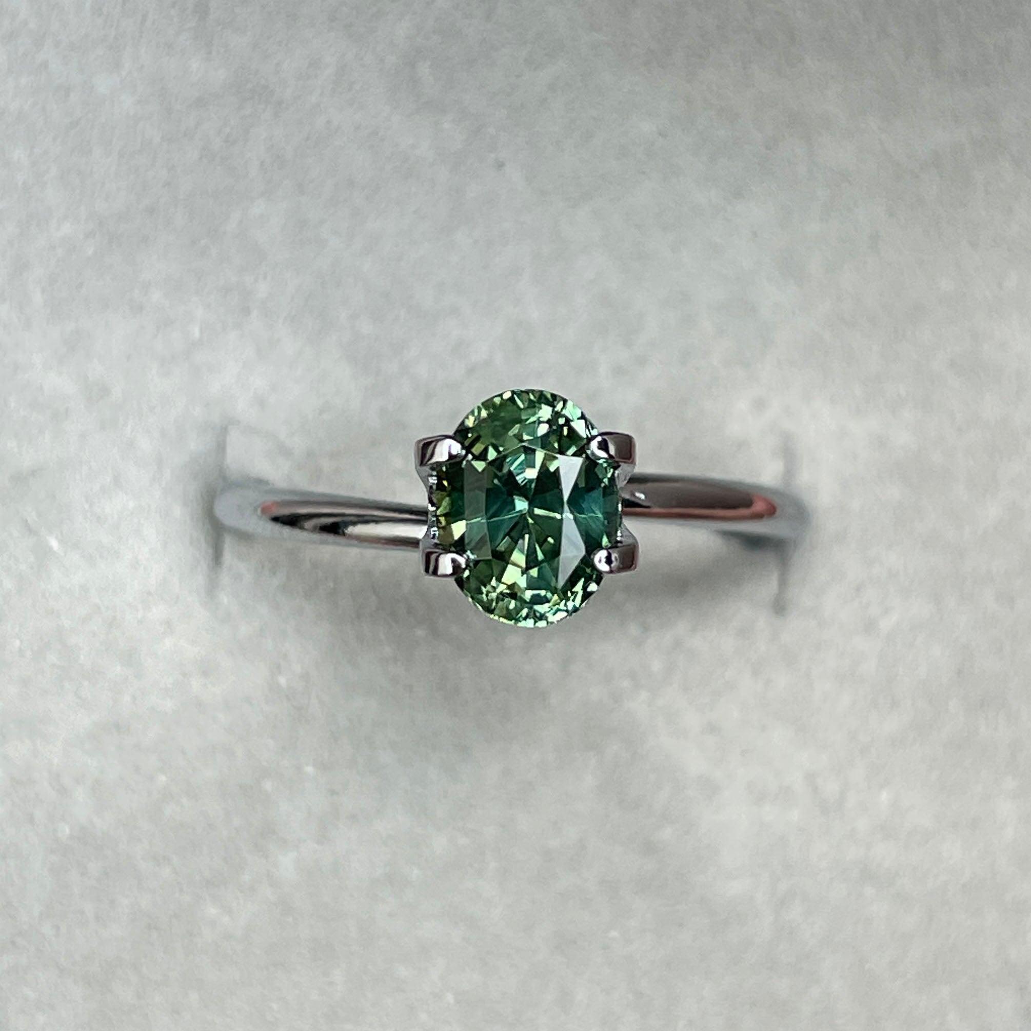 teal blue green parti sapphire oval cut gem