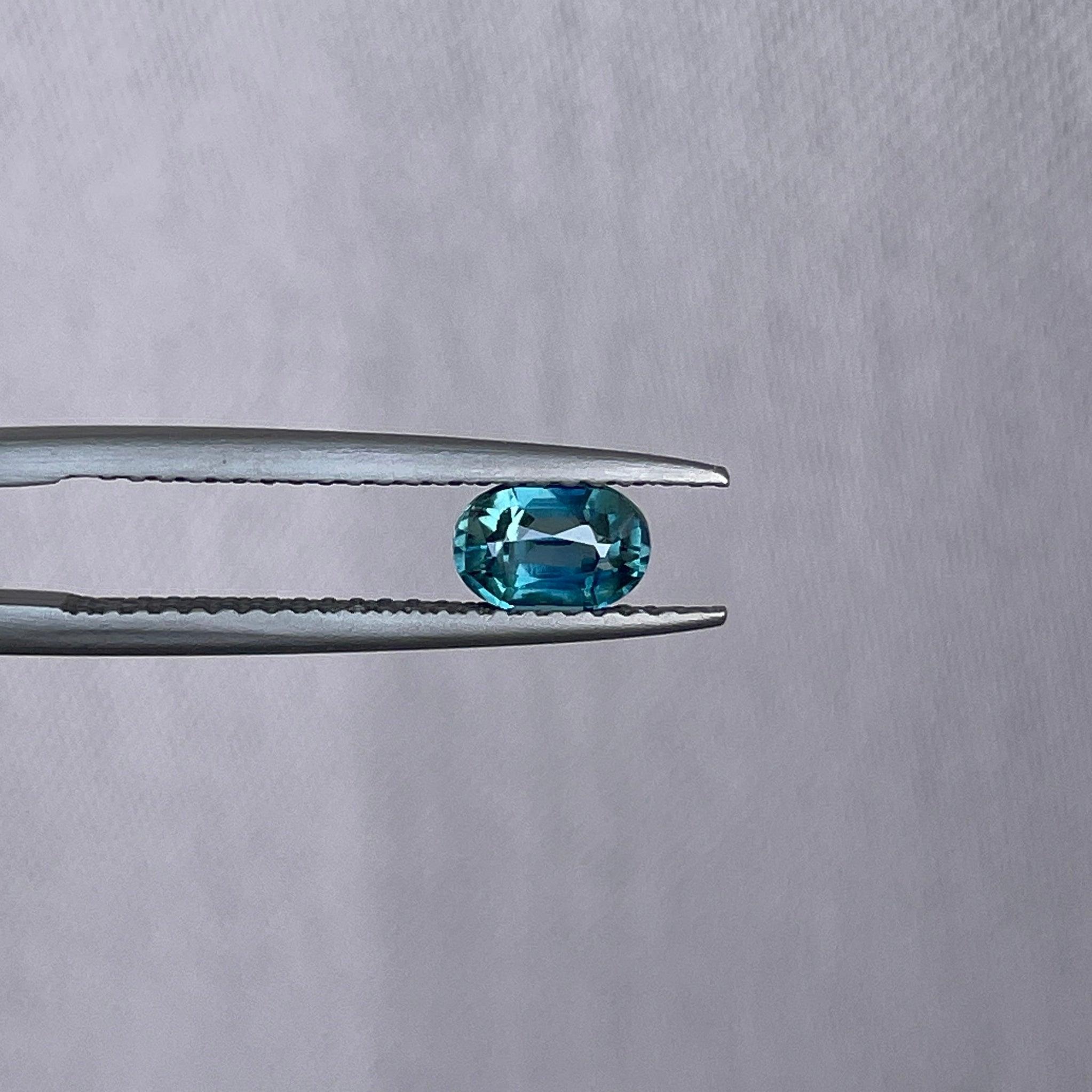 Loose sapphire heated certified blue green oval shape cut natural 0.73 ct - NASHGEMS