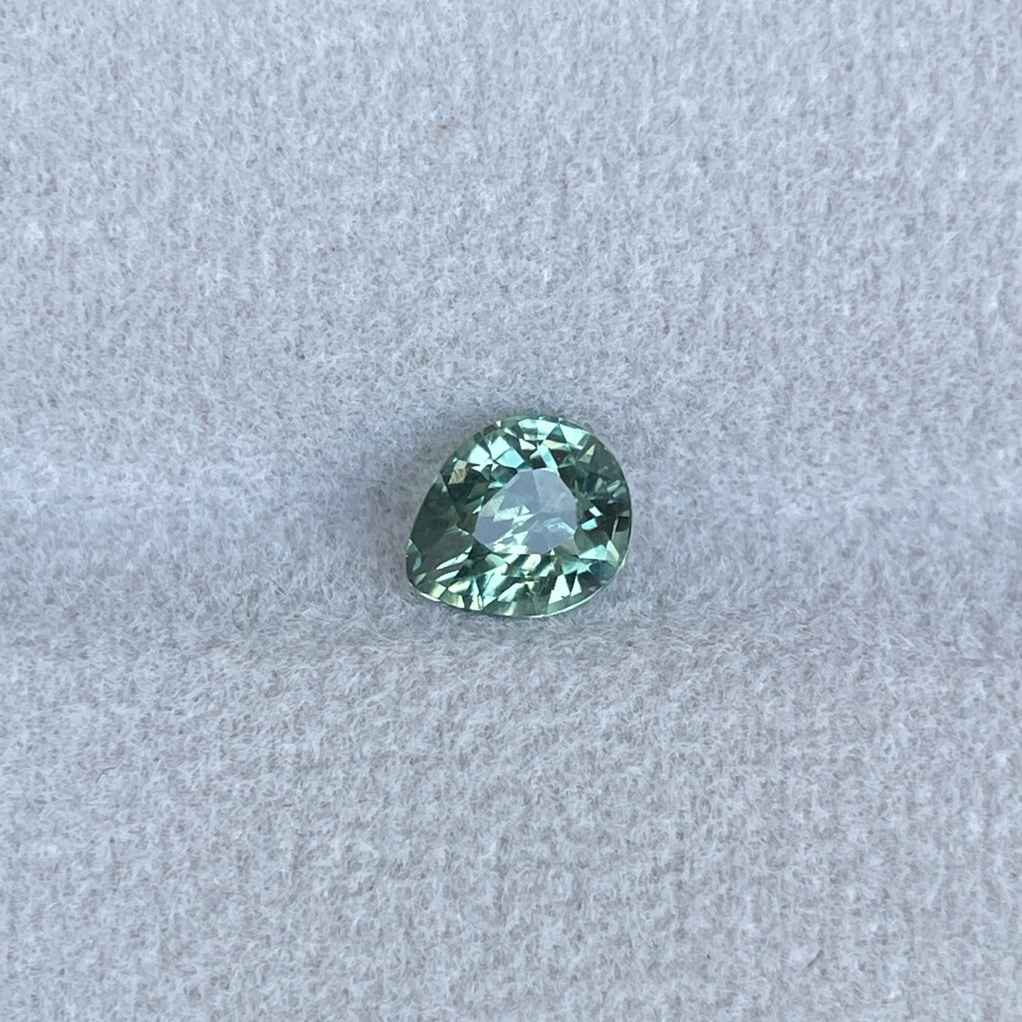 teal blue green parti sapphire pear drop cut gem