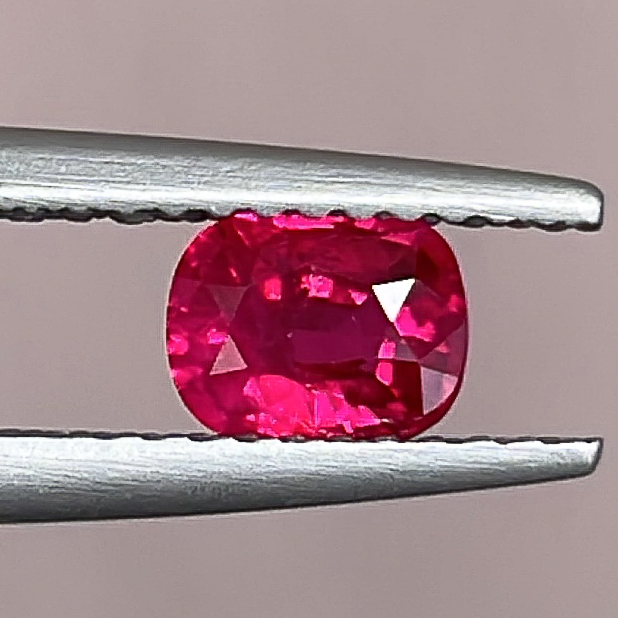 Natural 0.67 Ct cushion cut ruby loose gemstone from NASHGEMS, unheated and suitable for engagement rings.