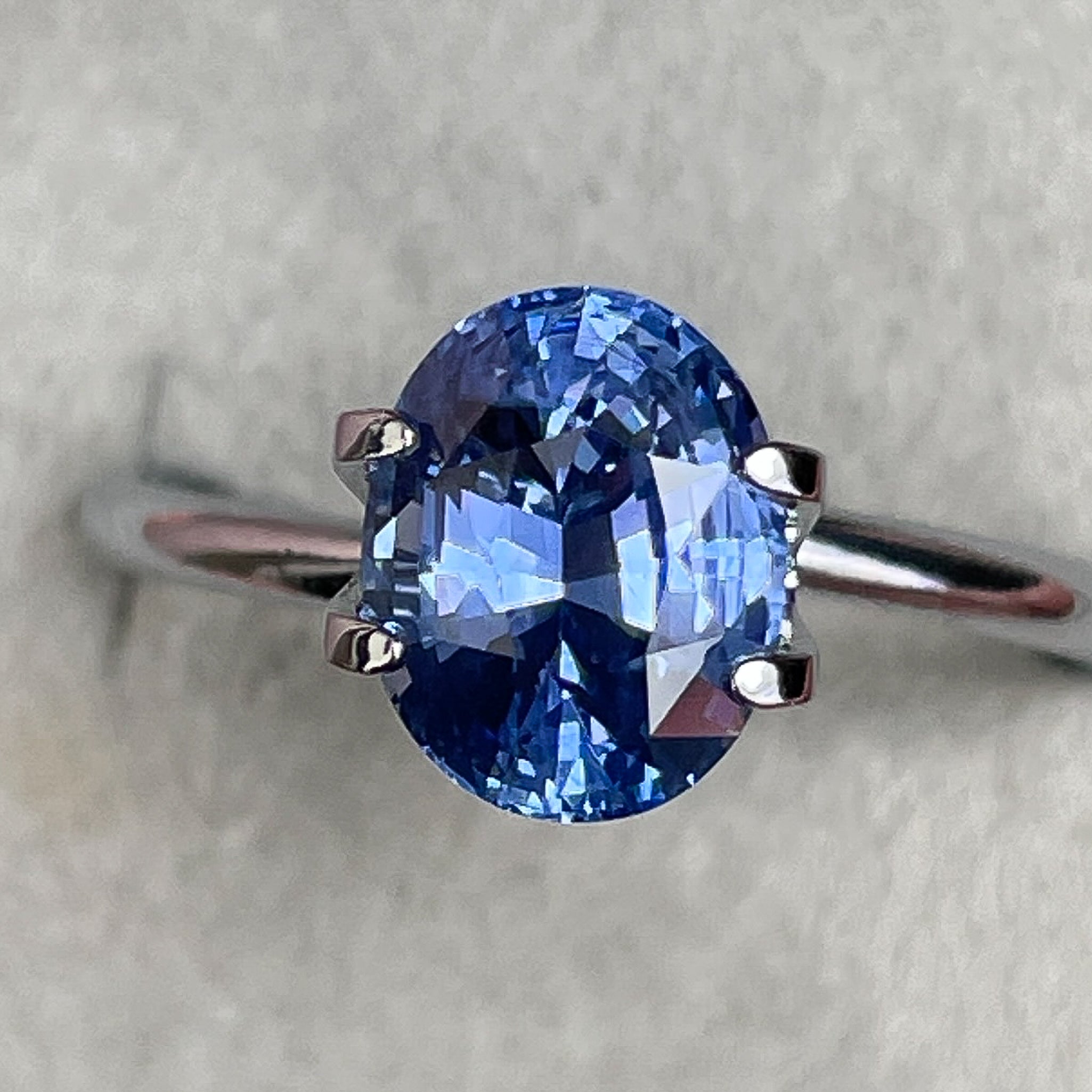 Natural Ceylon blue sapphire loose gemstone, 2.15 carats, oval cut, VVS clarity by NASHGEMS for engagement or custom jewelry.