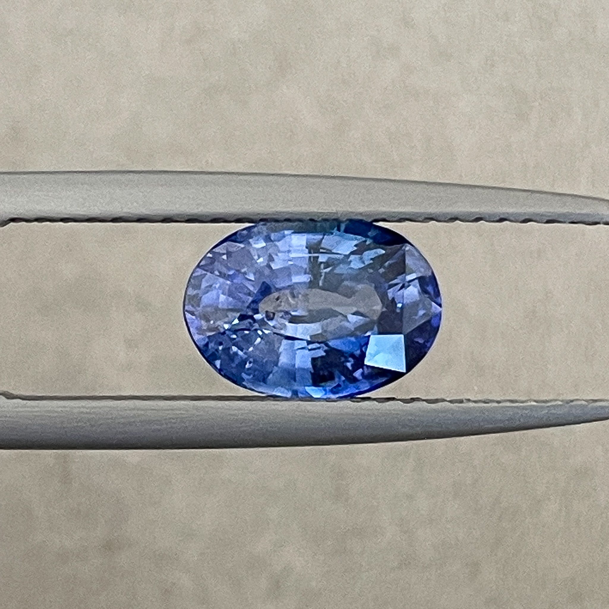 Natural Ceylon blue sapphire loose gemstone, 2.27 ct oval cut, ideal for engagement rings or custom jewelry from NASHGEMS.