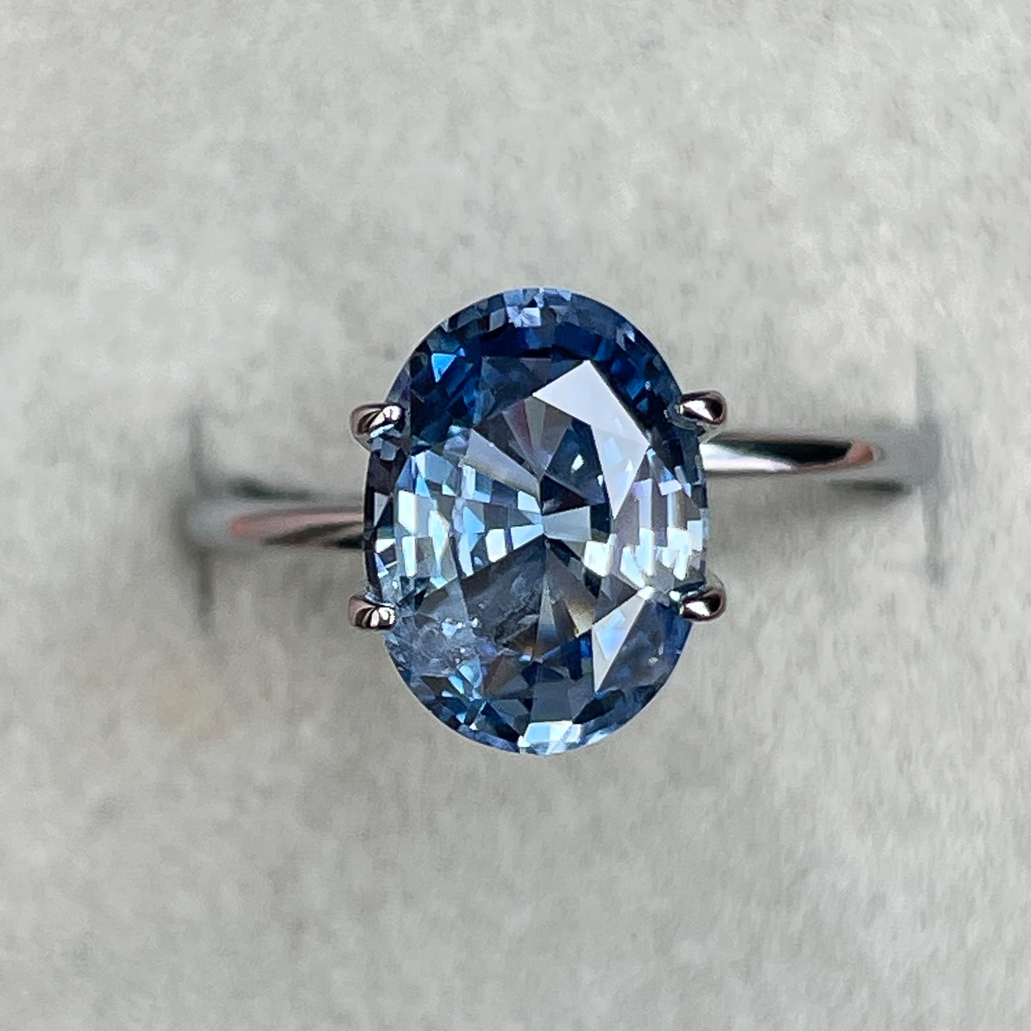 Natural Ceylon blue sapphire 3.34 ct oval cut loose gemstone by NASHGEMS, perfect for engagement rings or custom jewelry.