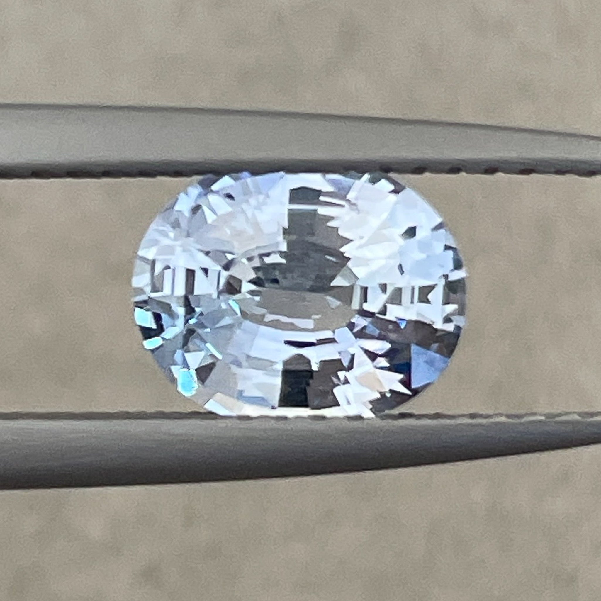 Natural Ceylon Pale Blue Sapphire 1.56 Ct oval cut, loose gemstone from NASHGEMS, vibrant and clear for engagement rings.