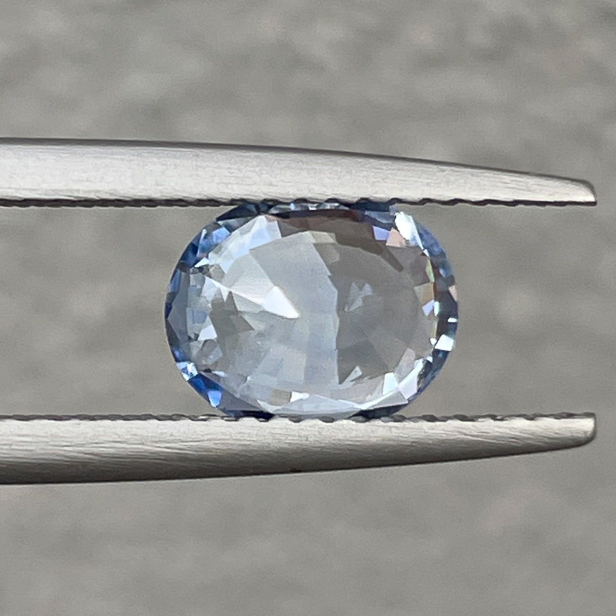 Natural Ceylon Pale Blue Sapphire 1.56 Ct oval cut loose gemstone from NASHGEMS, no heat VVS clarity for engagement rings.