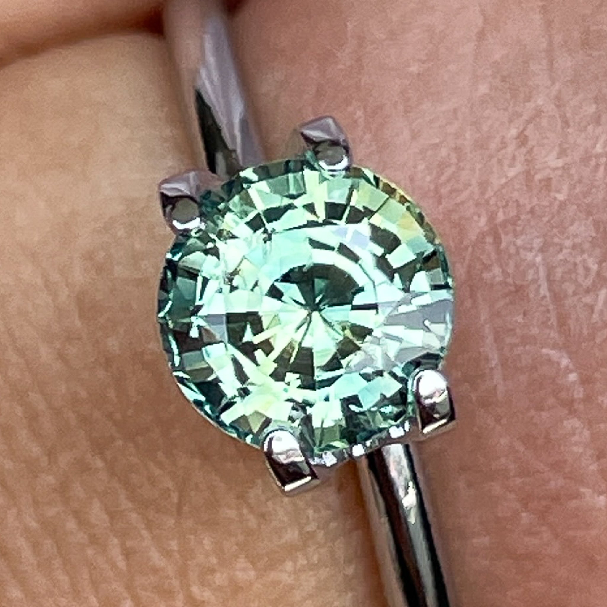 Natural green teal sapphire loose gemstone, 1.50 Ct round cut by NASHGEMS, ideal for engagement rings or custom jewelry.