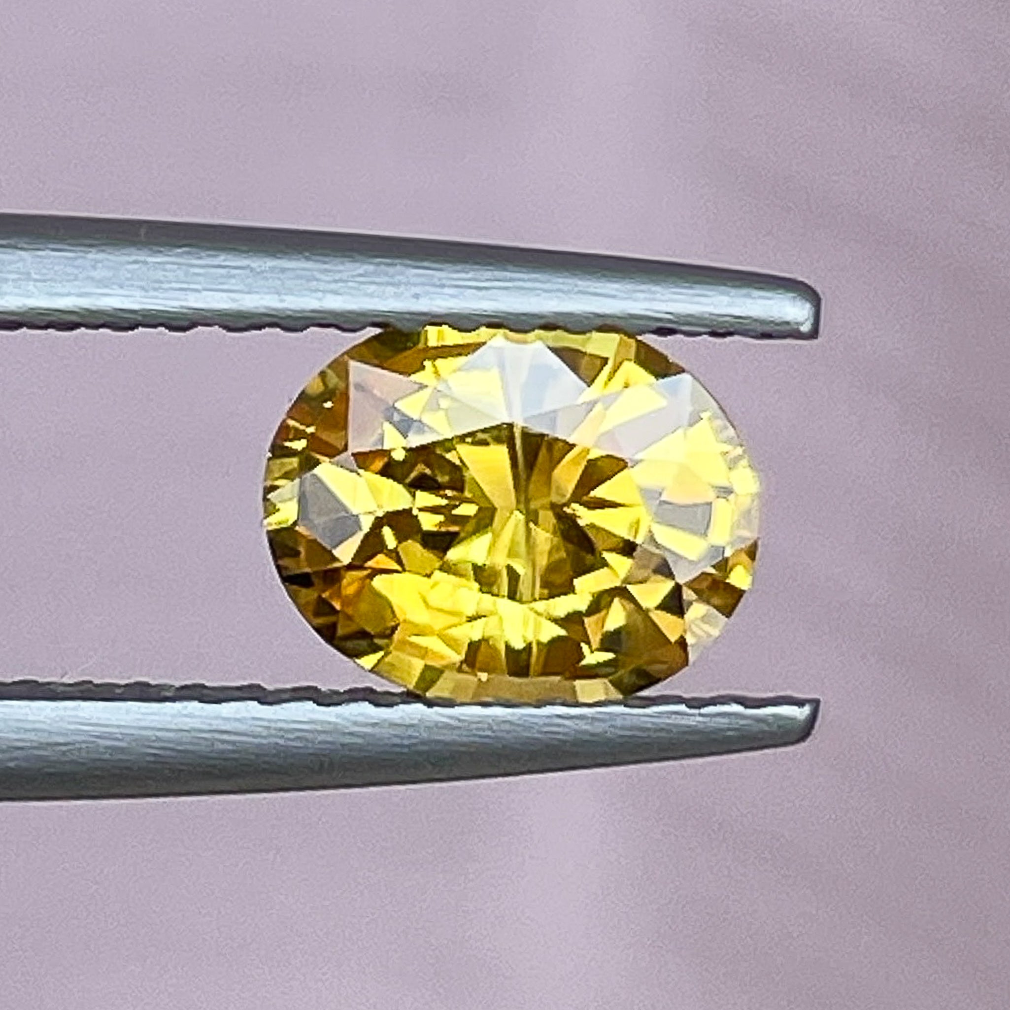 Natural yellow sapphire loose gemstone, 1.27 ct oval cut, heat-treated yellow sapphire by NASHGEMS for engagement jewelry.