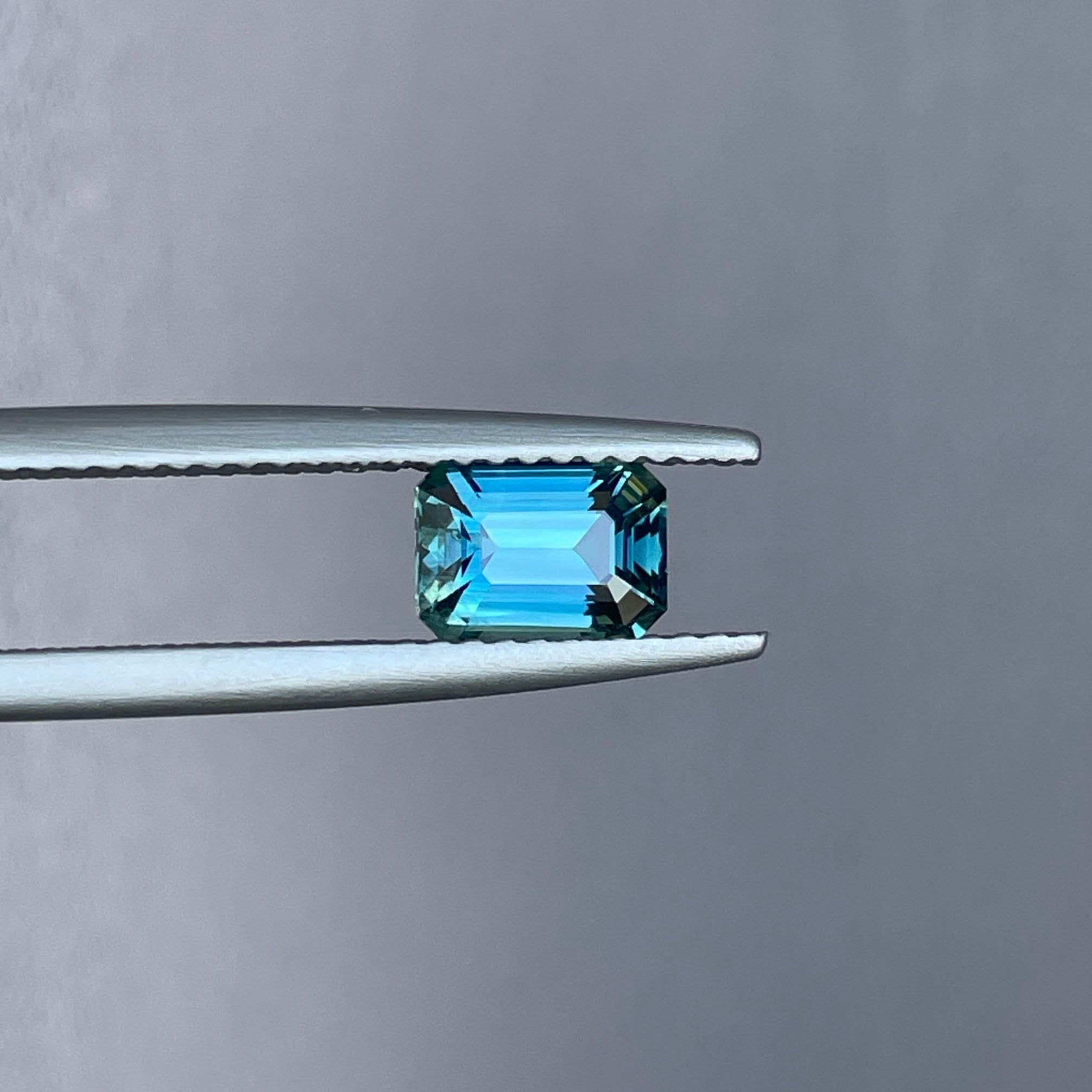 TEAL BLUE SAPPHIRE 1.16 EMERALD CUT