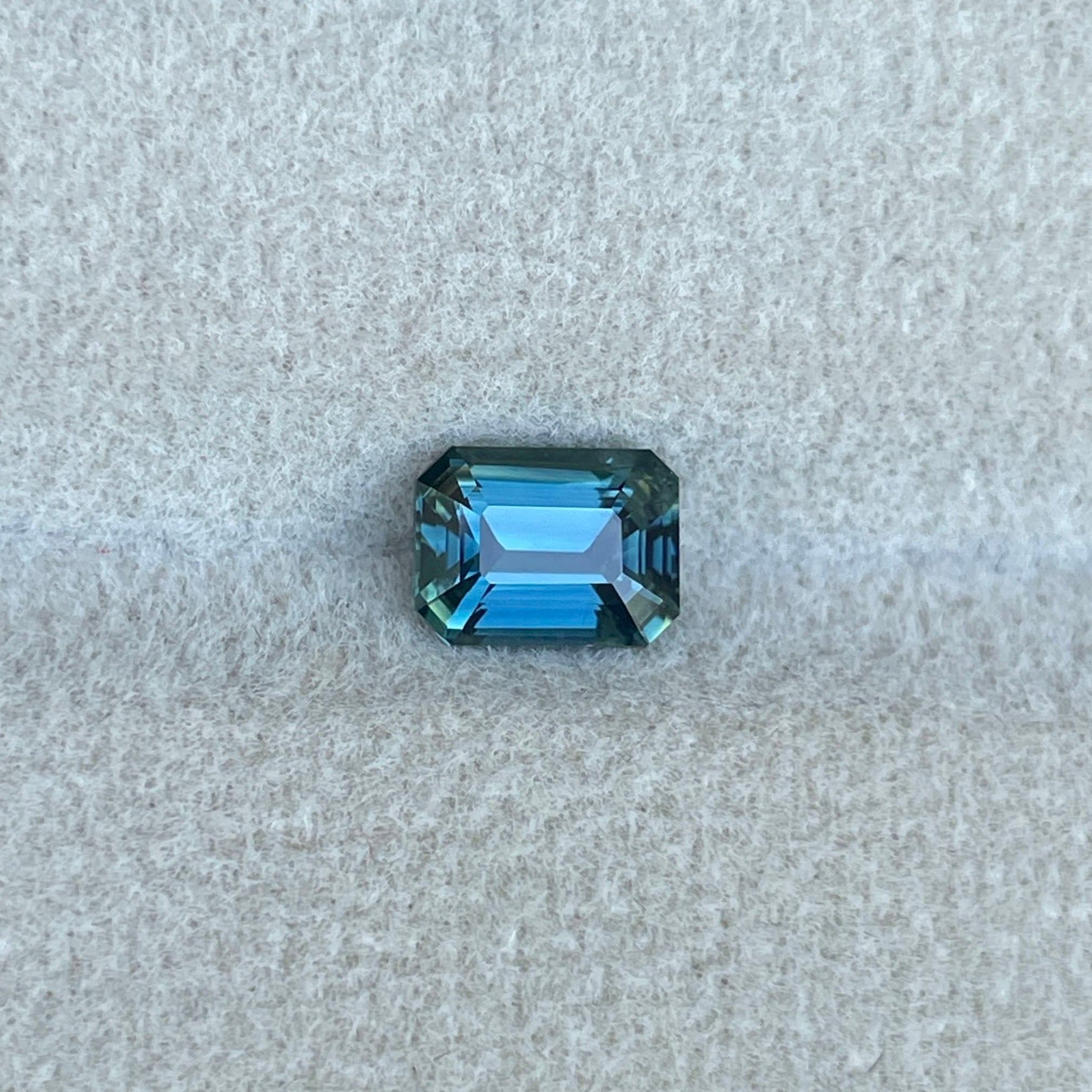 TEAL BLUE SAPPHIRE 1.16 EMERALD CUT