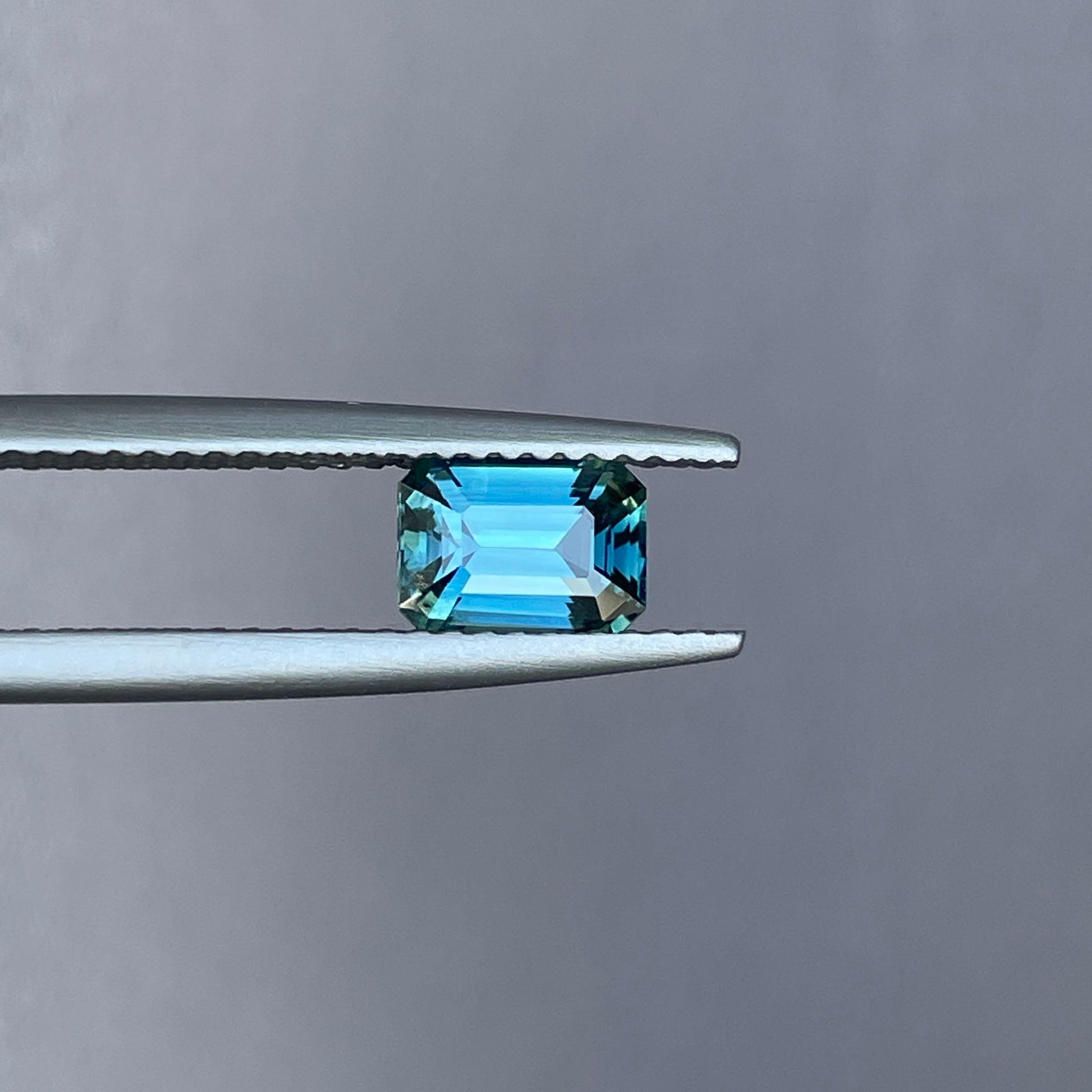 TEAL BLUE SAPPHIRE 1.16 EMERALD CUT