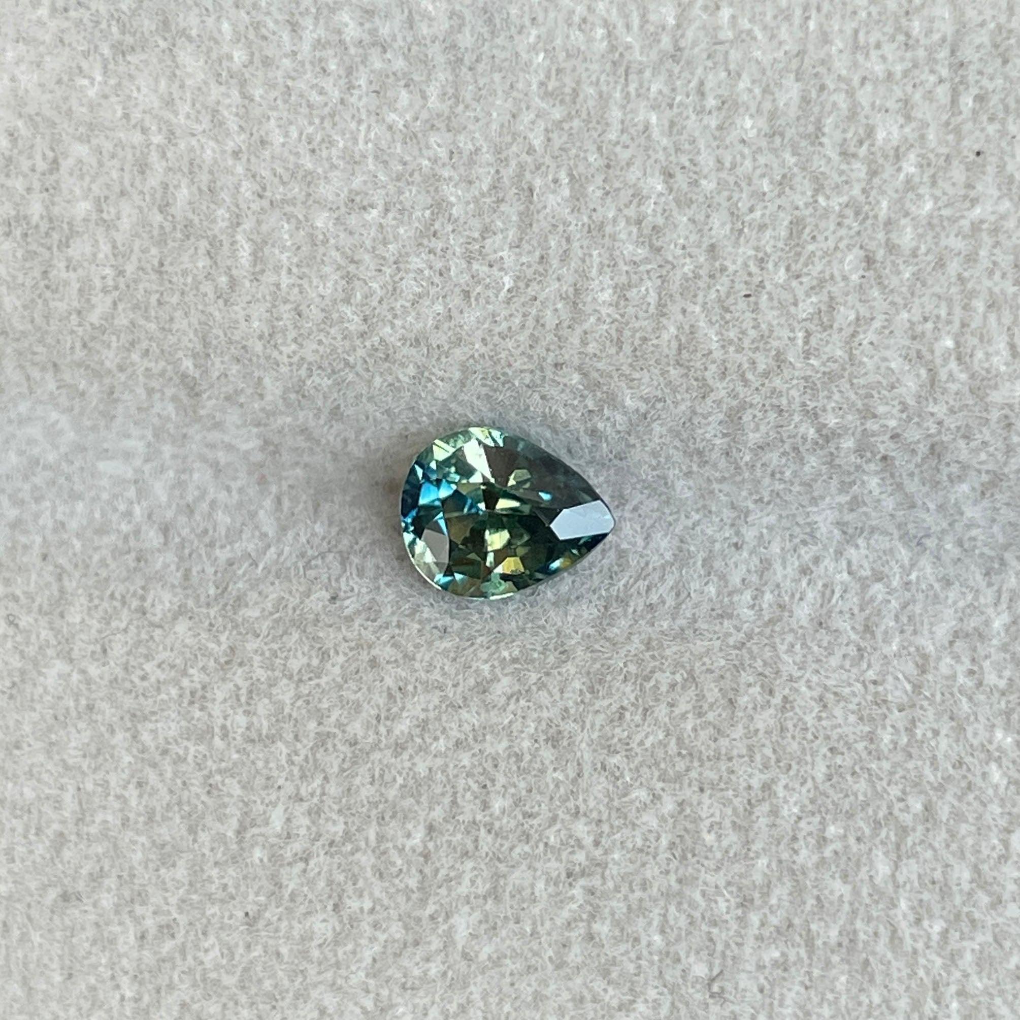 Bi-colored teal and green parti sapphire gemstone, 0.83 carats, loose precious stone for September birthstone by NASHGEMS.