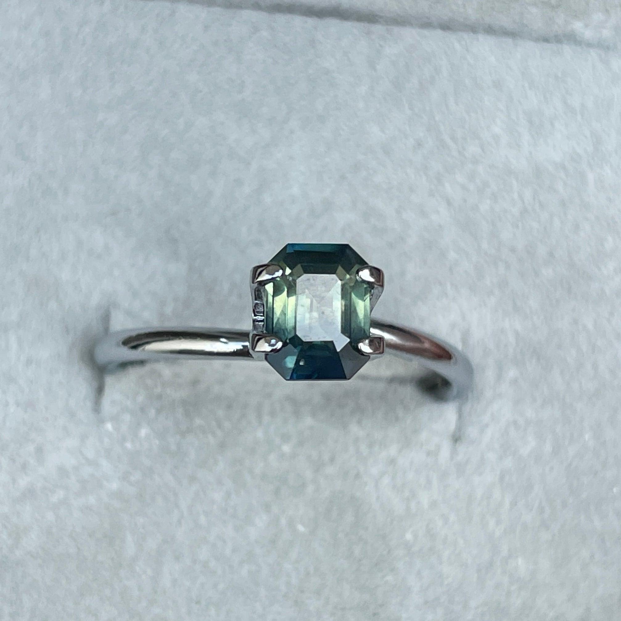 Teal sapphire loose gemstone, 1.09 carats, bi-colored parti sapphire in green and blue, from NASHGEMS for September birthstone jewelry.