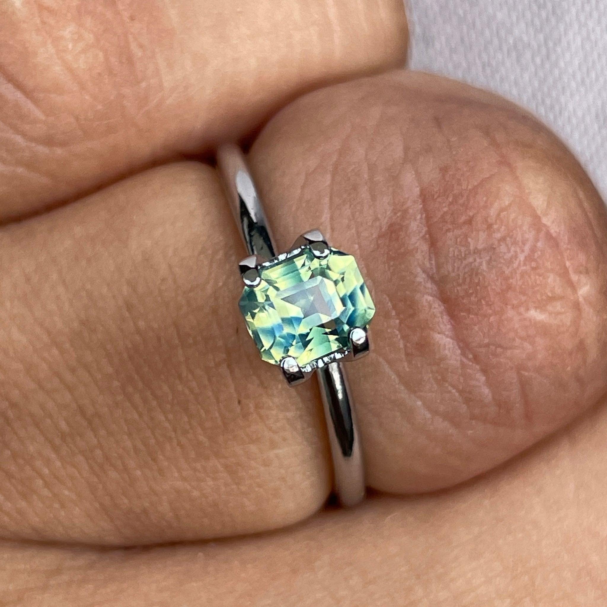 Teal sapphire loose gemstone in emerald cut, 1.11 carats, bi-colored parti sapphire from NASHGEMS, perfect September birthstone.