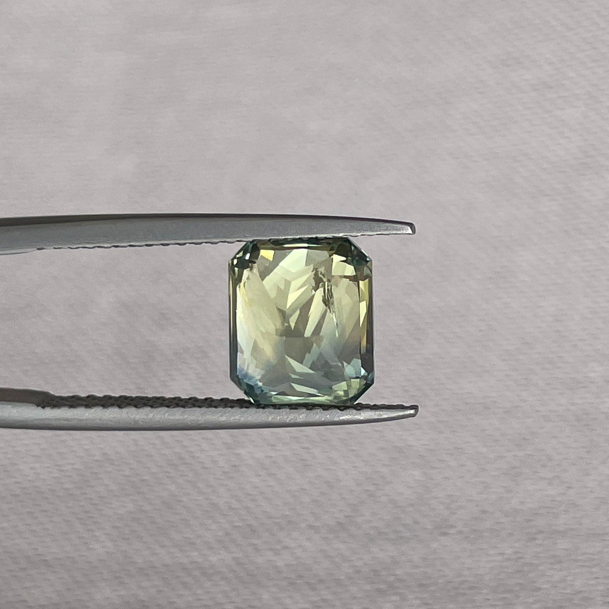 Bi-colored teal sapphire gemstone, 4.55 carats, radiant cut, loose parti sapphire for jewelry, September birthstone from NASHGEMS.