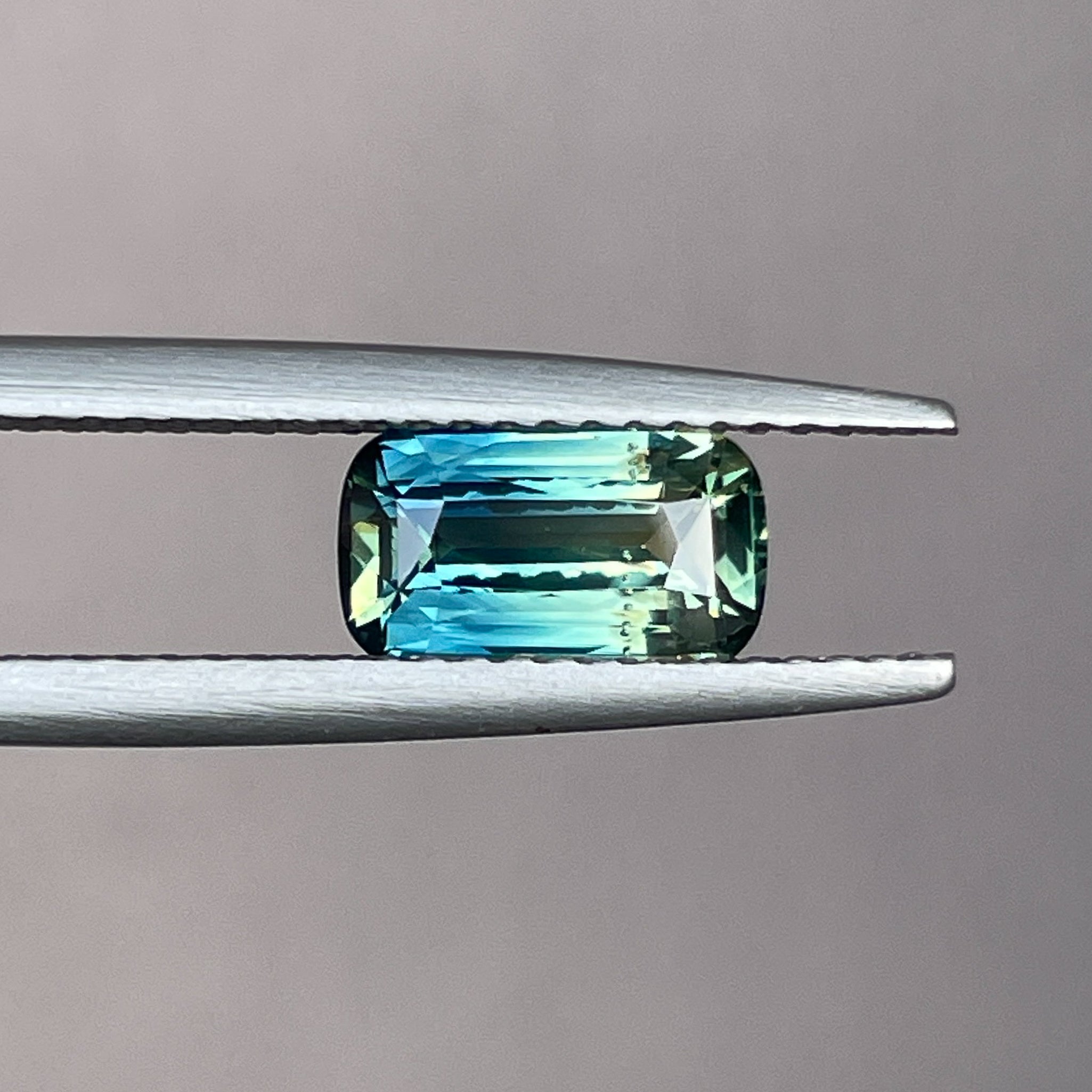 Teal parti bi-color sapphire 1.55 Ct elongated cushion cut, loose gemstone for engagement or custom jewelry by NASHGEMS.