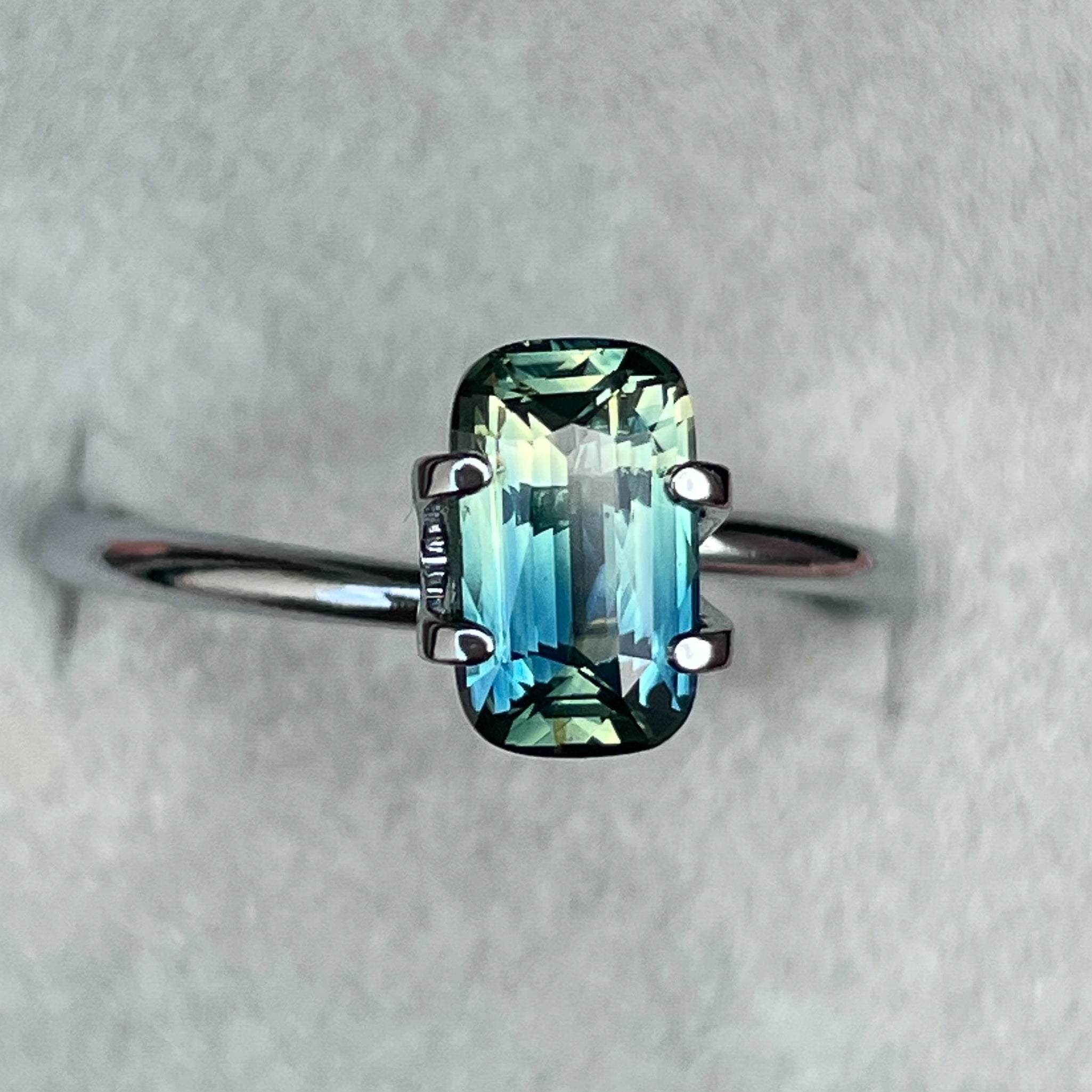 Teal natural parti bi-color sapphire, 1.55 ct elongated cushion cut, loose gemstone for engagement rings or custom jewelry by NASHGEMS.