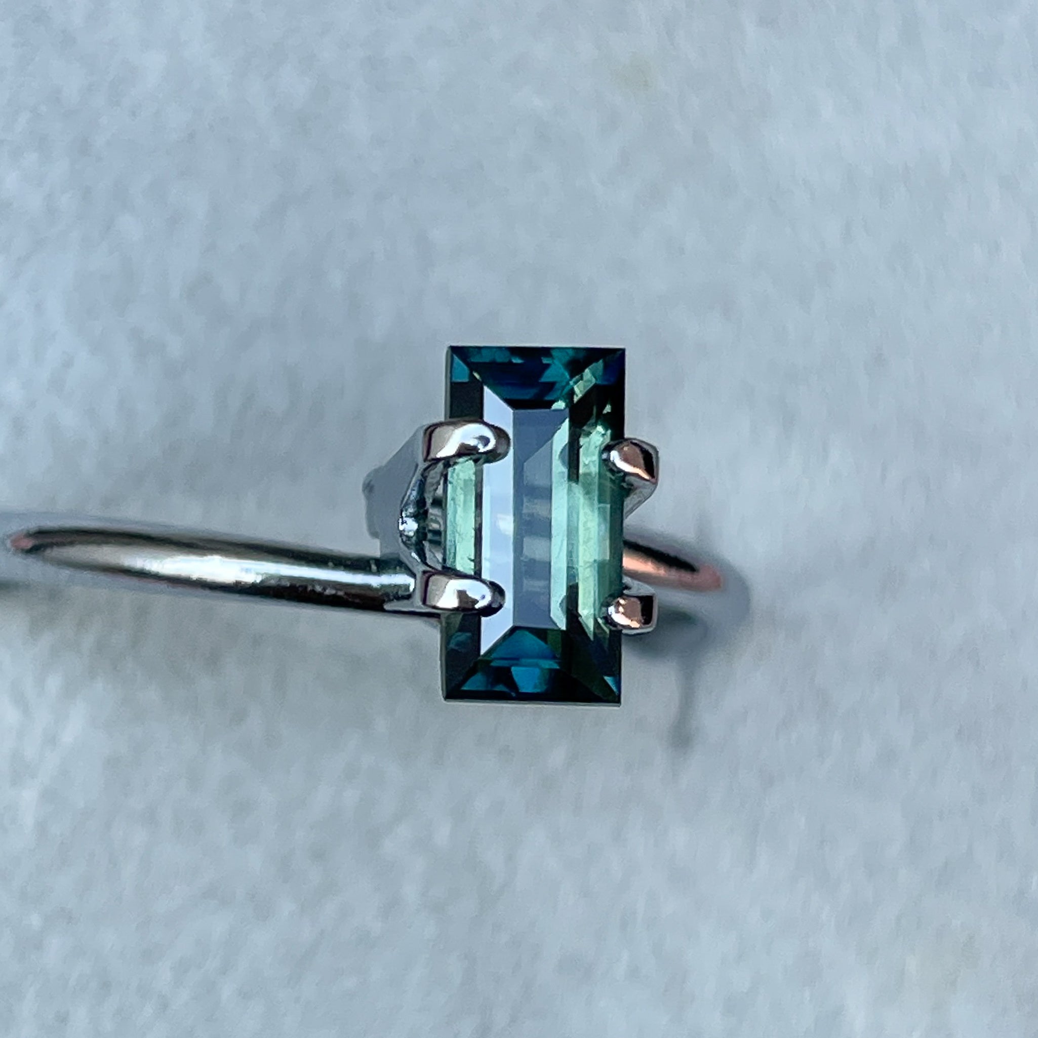 Teal sapphire 1.30 Ct bicolour parti cut gemstone from NASHGEMS, perfect for engagement rings or green gemstone jewelry.