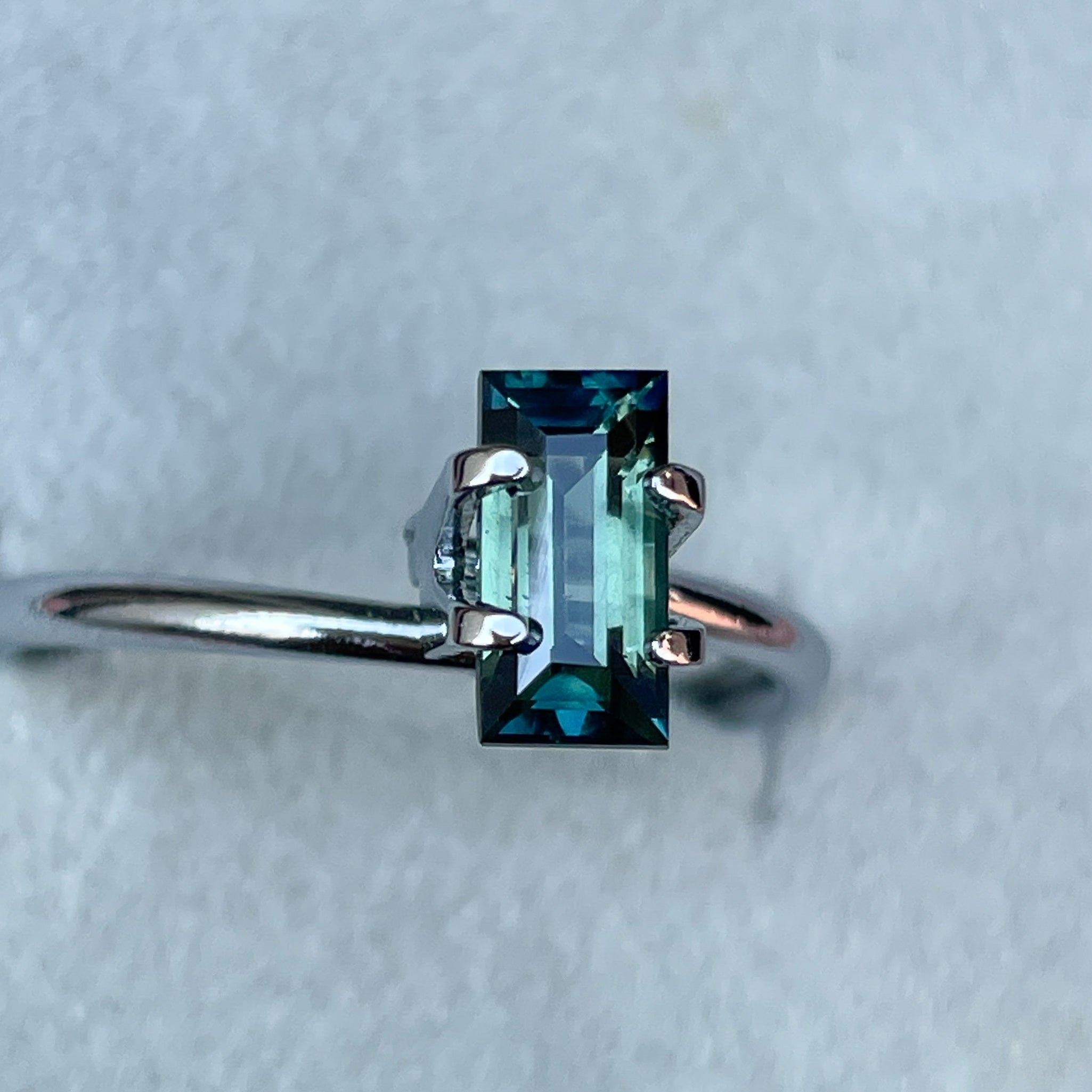 Teal sapphire with bicolor parti effect, 1.30 Ct, princess cut, from NASHGEMS, suitable for engagement rings or green gemstone jewelry