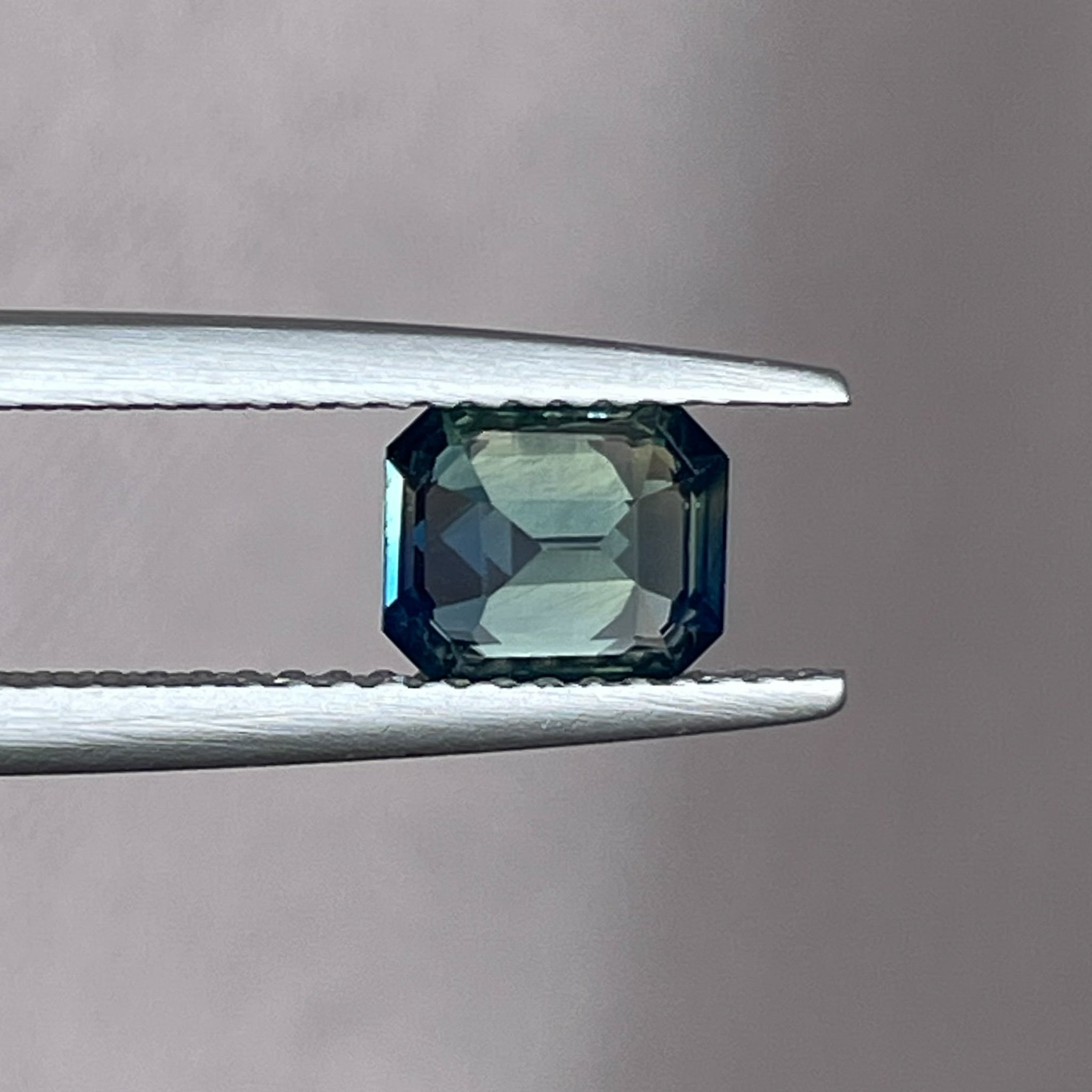 Natural teal blue-green bi-color sapphire, 1.38 Ct emerald cut, loose no-heat sapphire from NASHGEMS, ideal for engagement rings.