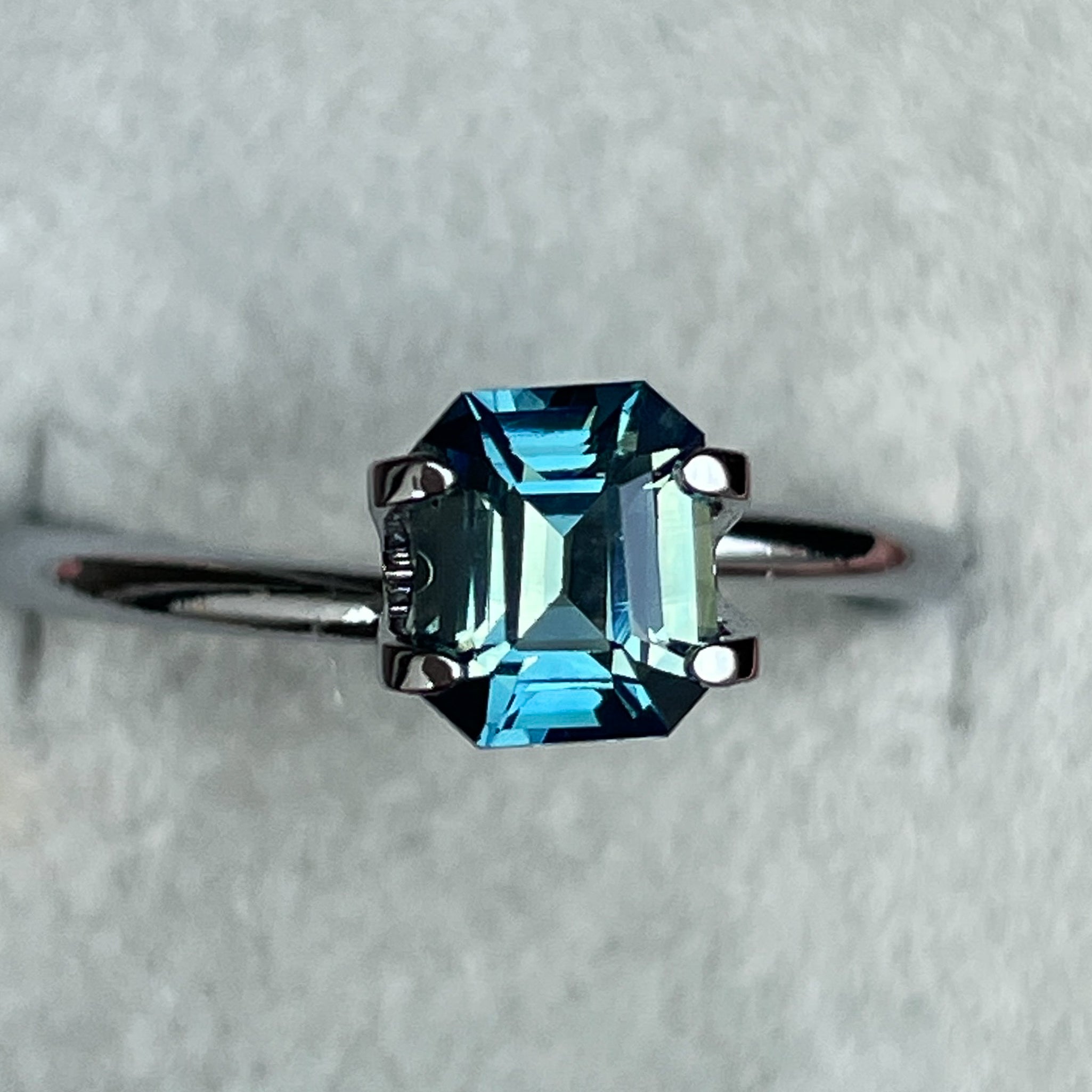 Natural teal blue green bi-color sapphire 1.38 Ct emerald cut, loose no heat sapphire from NASHGEMS for engagement rings