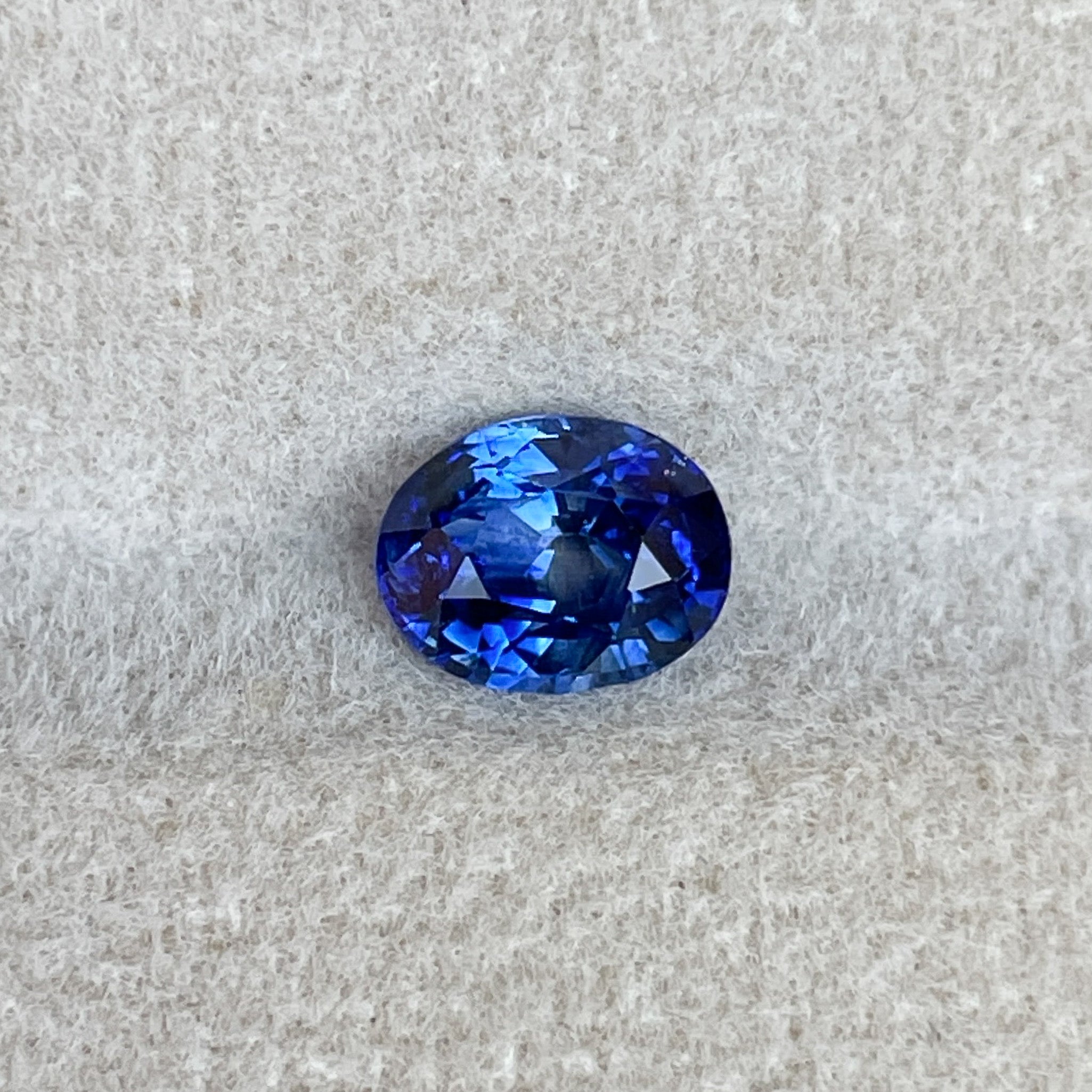Natural Ceylon blue sapphire loose stone, 1.08 Ct oval cut, heat treated, ideal for engagement rings or custom jewelry.