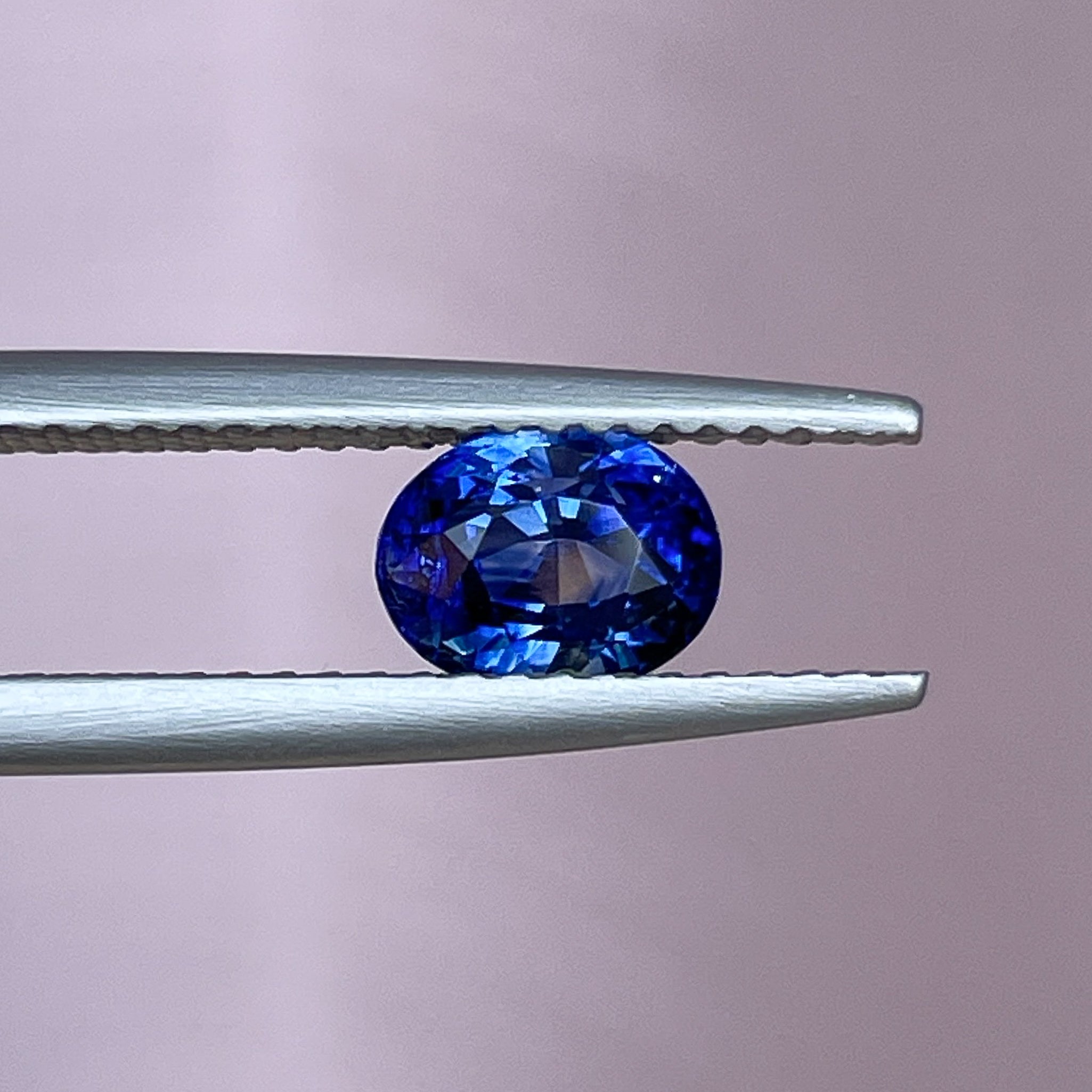 Natural Ceylon blue sapphire 1.08 ct oval cut loose gemstone by NASHGEMS, ideal for engagement rings or custom jewelry.