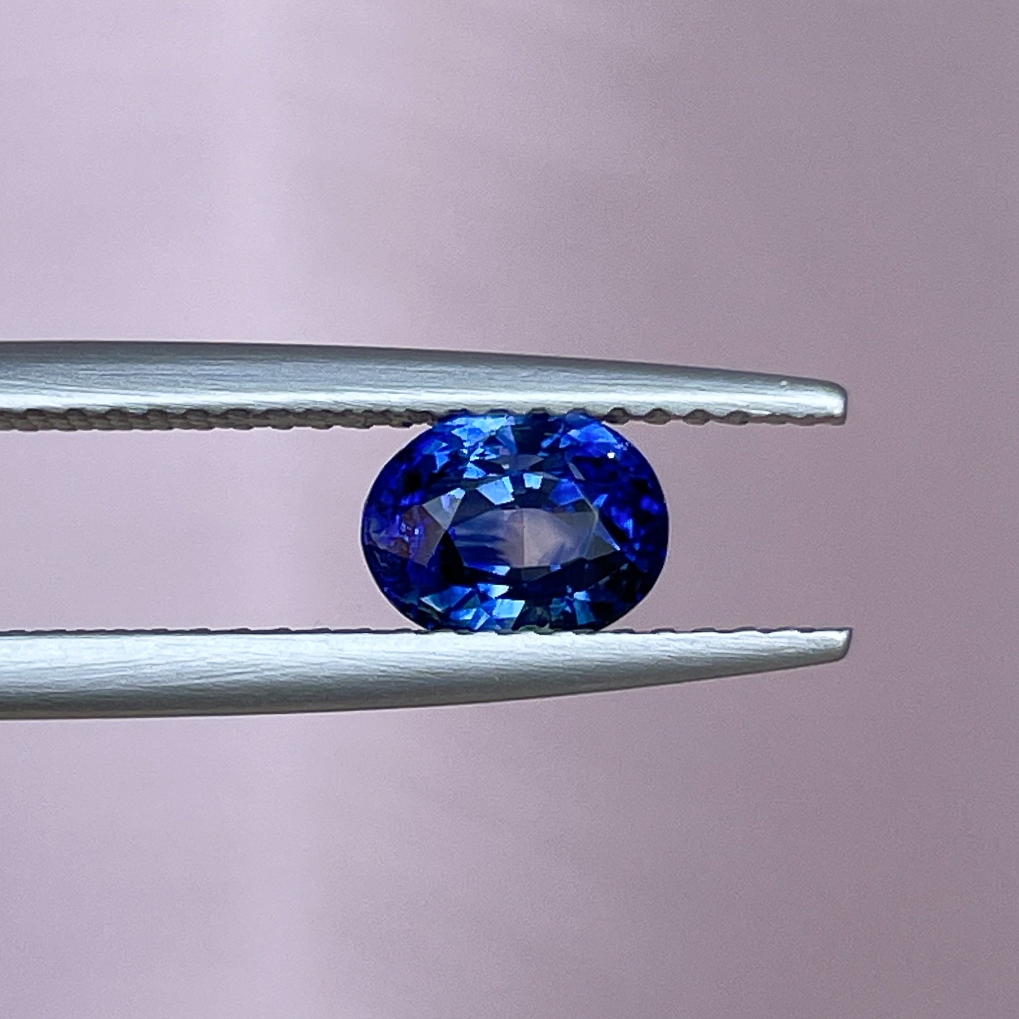Natural Ceylon blue sapphire loose stone, 1.08 Ct oval cut, heat treated, ideal for engagement rings or custom jewelry.