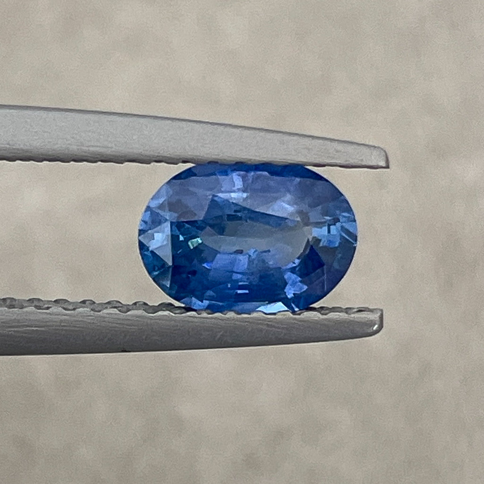 Natural Ceylon Blue Sapphire 0.97 Ct oval cut loose gemstone from NASHGEMS, ideal for engagement rings.