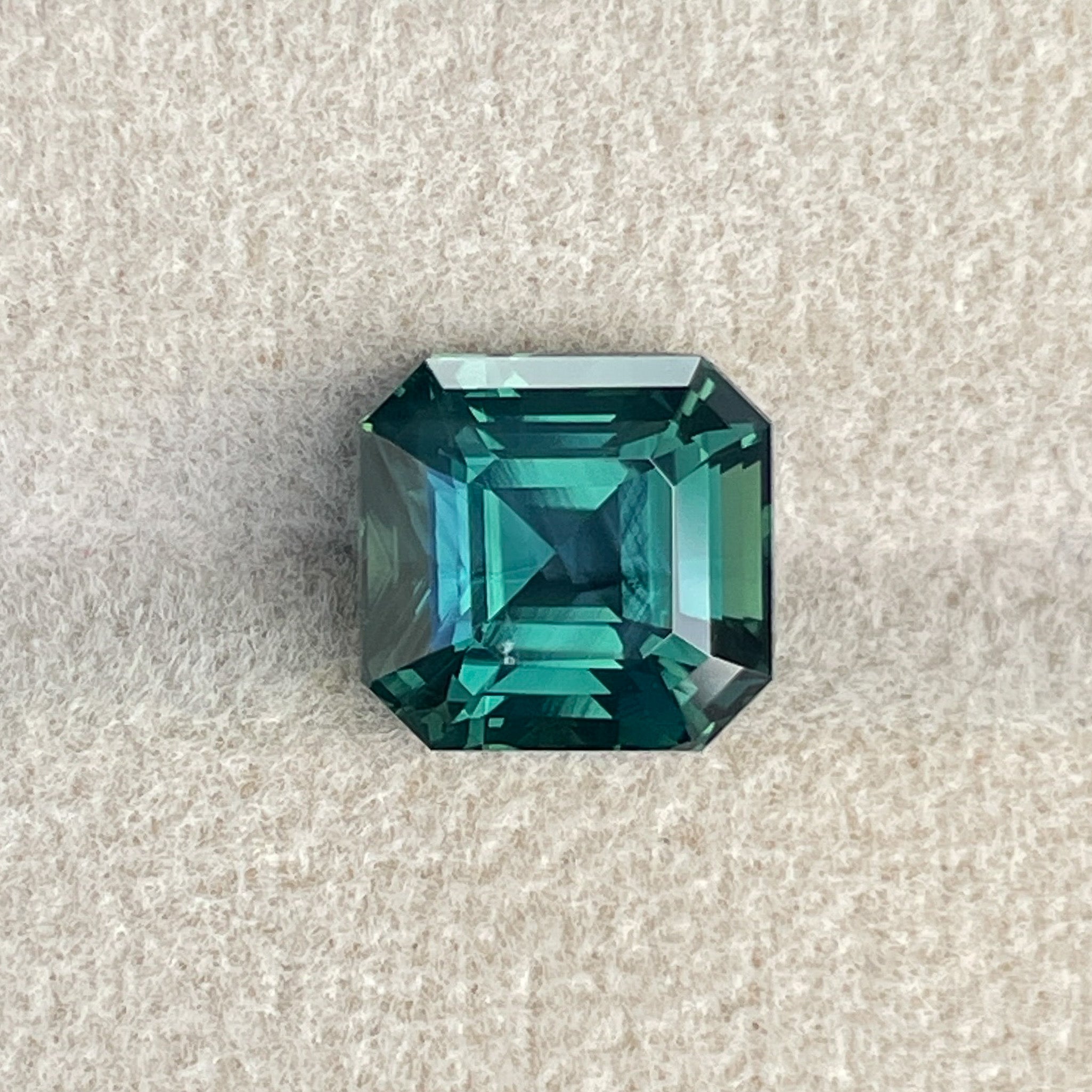 Teal green sapphire 5.08 Ct Asscher emerald cut by NASHGEMS, loose no heat gemstone ideal for engagement or custom jewelry.