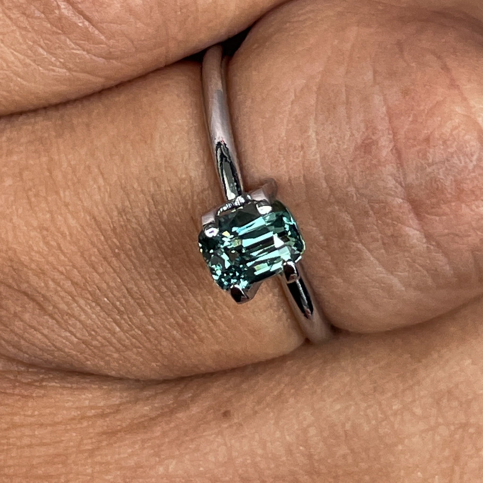 Teal green sapphire loose cushion cut 1.03 Ct from NASHGEMS, heat treated gemstone for engagement rings or custom jewelry.
