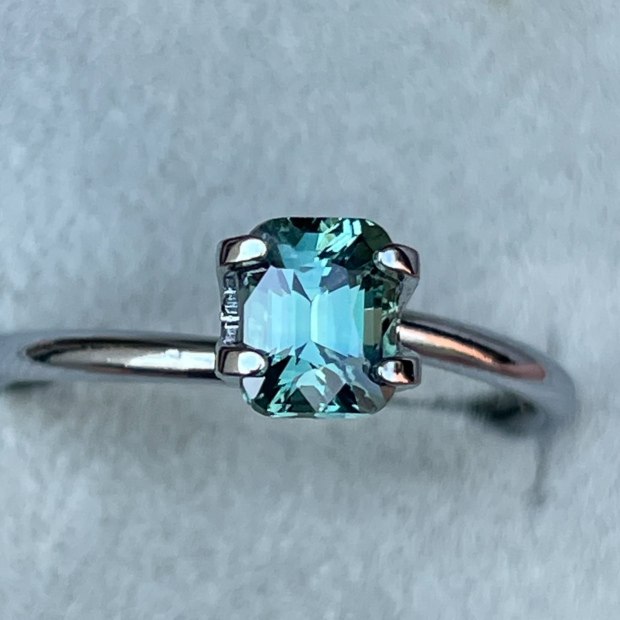 Natural teal green sapphire 1.11 Ct cushion cut loose gemstone by NASHGEMS, ideal for engagement rings or custom jewelry designs.