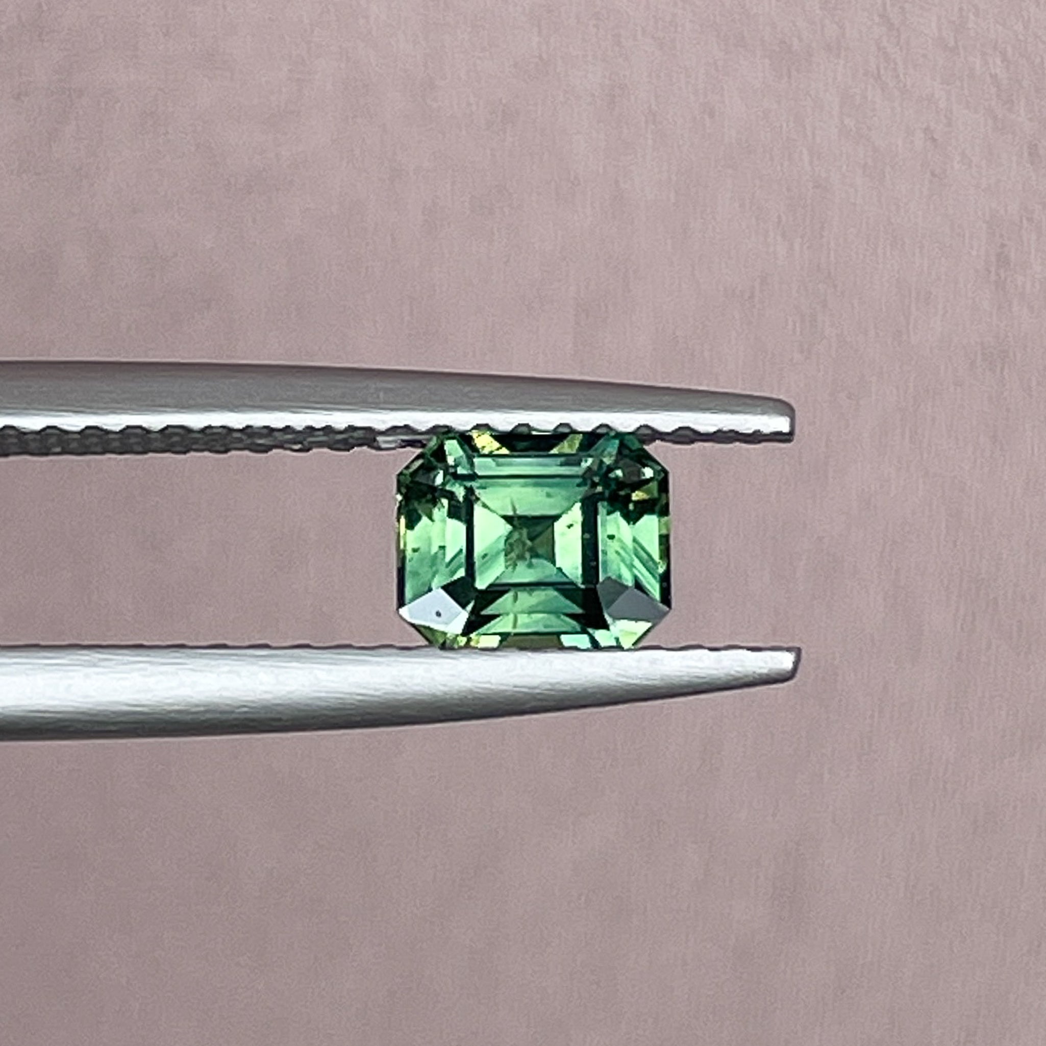 Natural green sapphire 1.04 Ct emerald cut loose gemstone by NASHGEMS, ideal for engagement rings or custom jewelry.