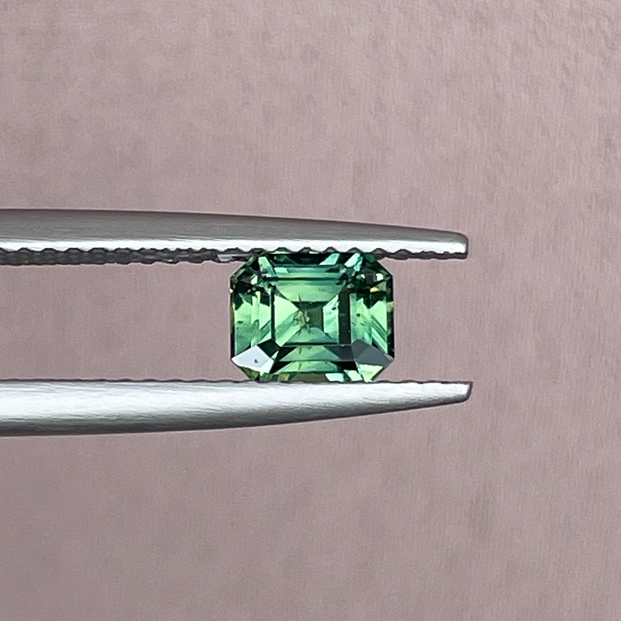 Natural green sapphire 1.04 Ct emerald cut loose gemstone by NASHGEMS, ideal for engagement rings or custom jewelry.