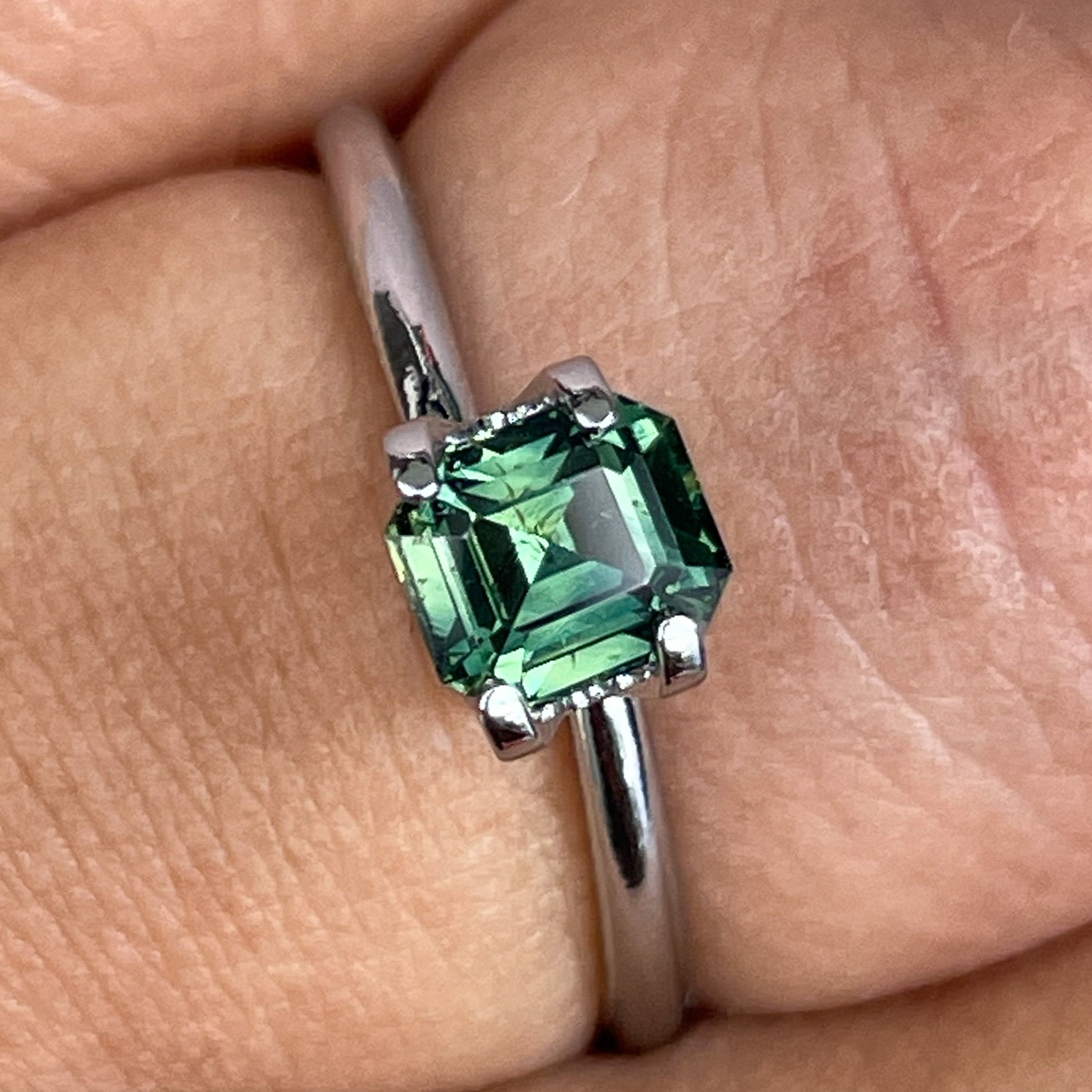 Natural green sapphire 1.04 Ct emerald cut loose gemstone by NASHGEMS, ideal for engagement rings or custom jewelry.