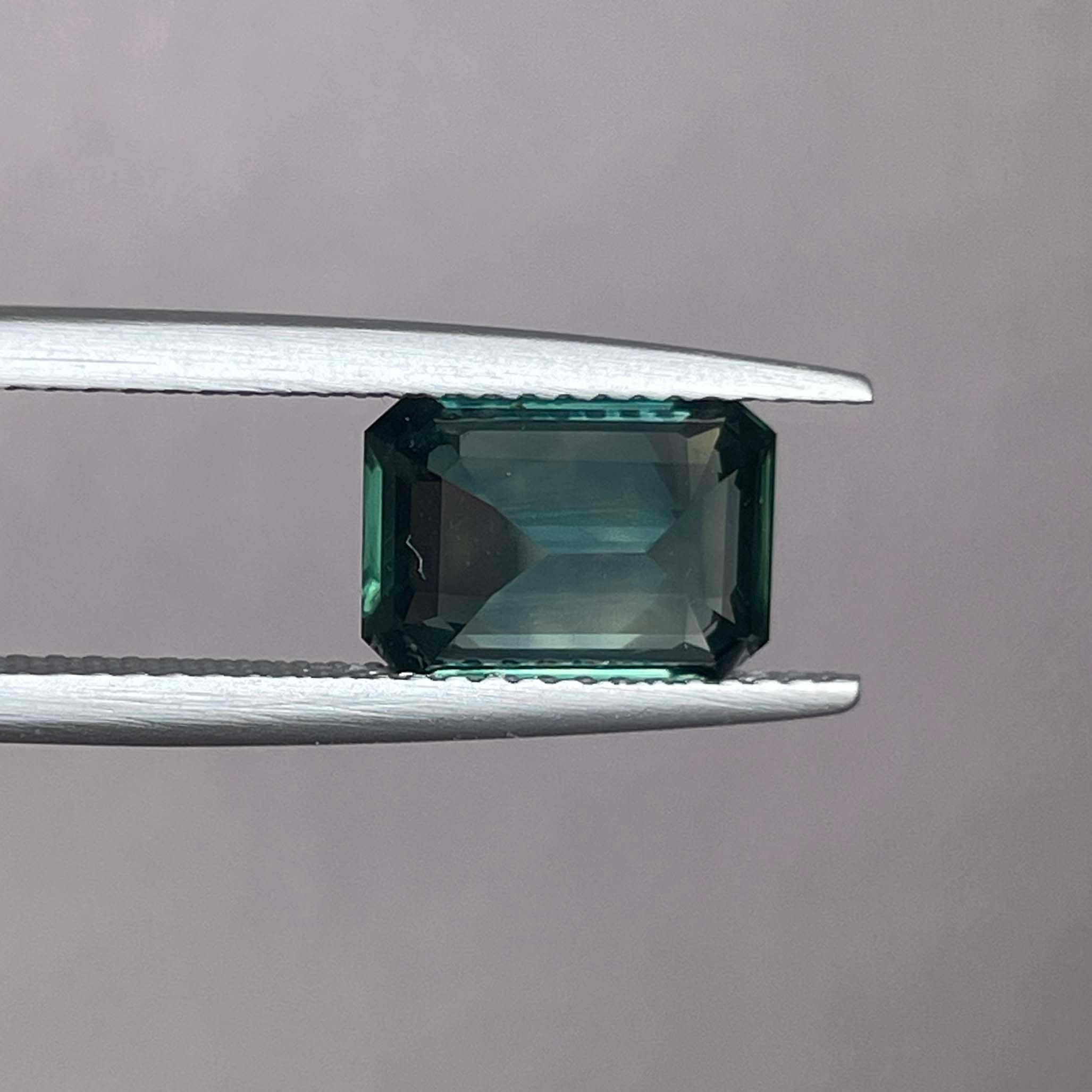 Natural green sapphire 3.03 Ct emerald cut loose gemstone from NASHGEMS, showcasing a vibrant teal color for engagement rings.