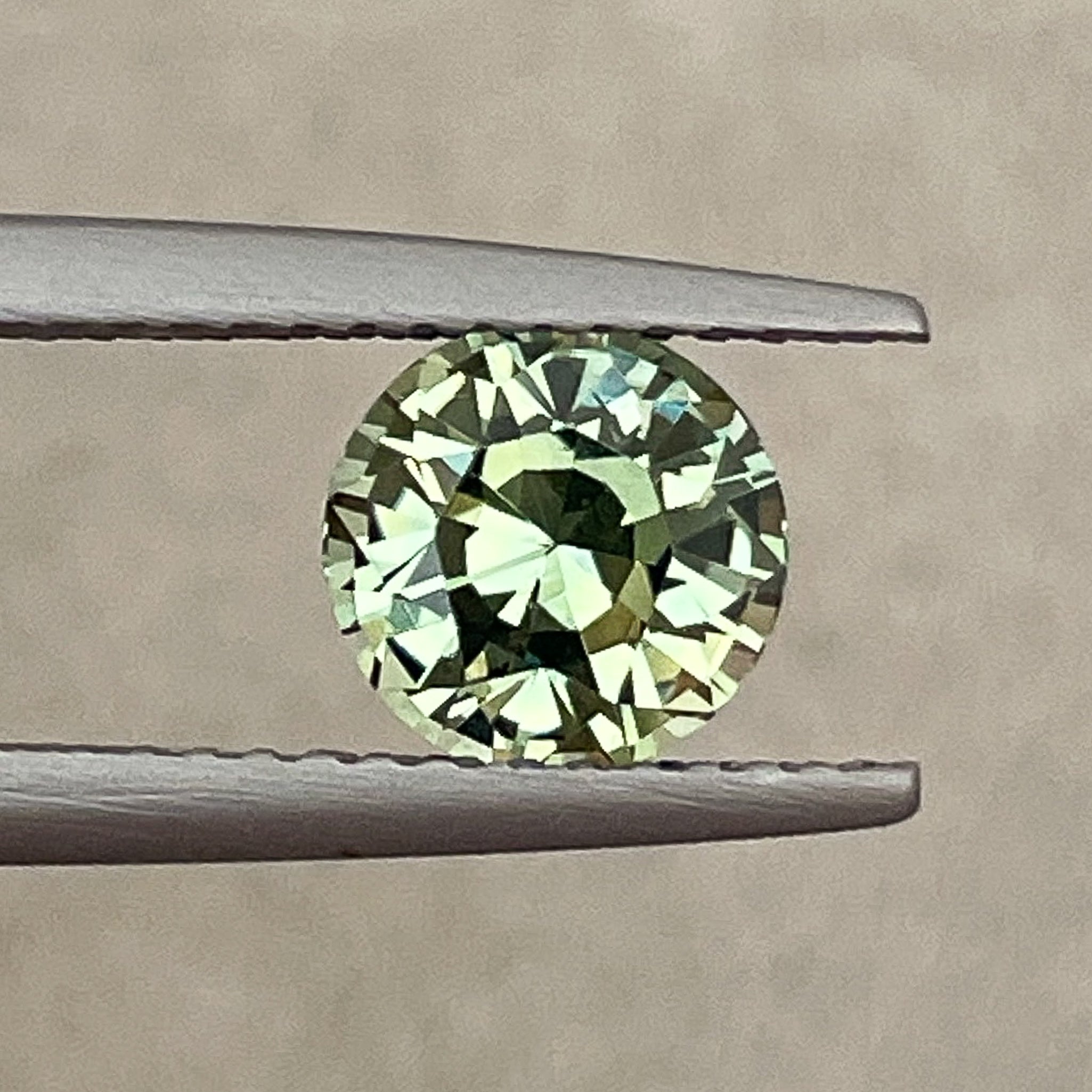 Natural pale green teal sapphire, 1.90 Ct round cut loose gemstone by NASHGEMS, ideal for engagement rings or custom jewelry.