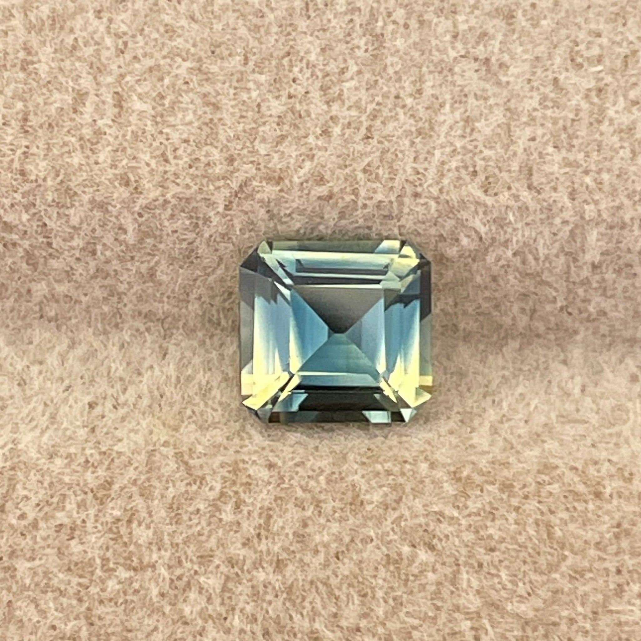 Natural teal sapphire gemstone, 1.08 Ct emerald cut, no heat, from NASHGEMS, ideal for pendants or custom jewelry.
