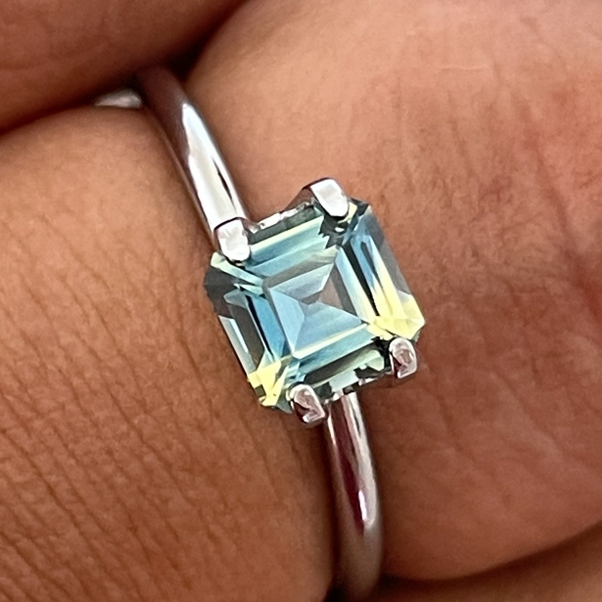 Natural teal sapphire 1.08 ct emerald cut from NASHGEMS, no heat, ideal for pendants or custom jewelry, vibrant gemstone.