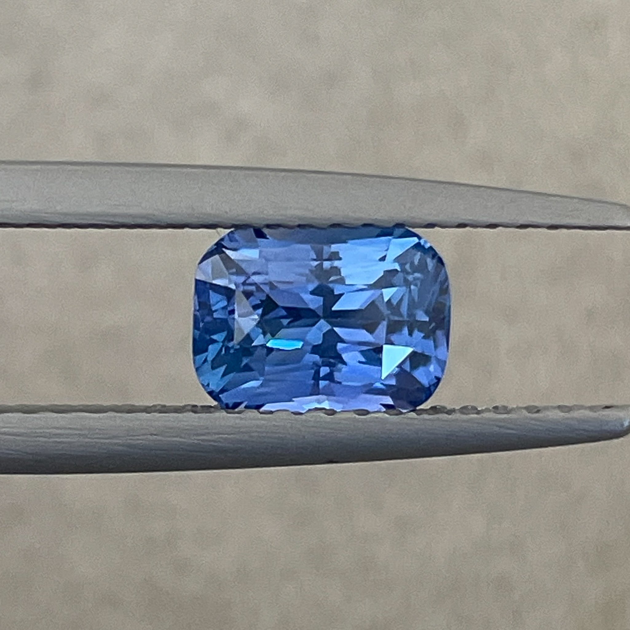 Natural Ceylon Blue Sapphire 1.60 Ct cushion cut loose gemstone from NASHGEMS, vivid blue sapphire suitable for jewelry and engagement rings.
